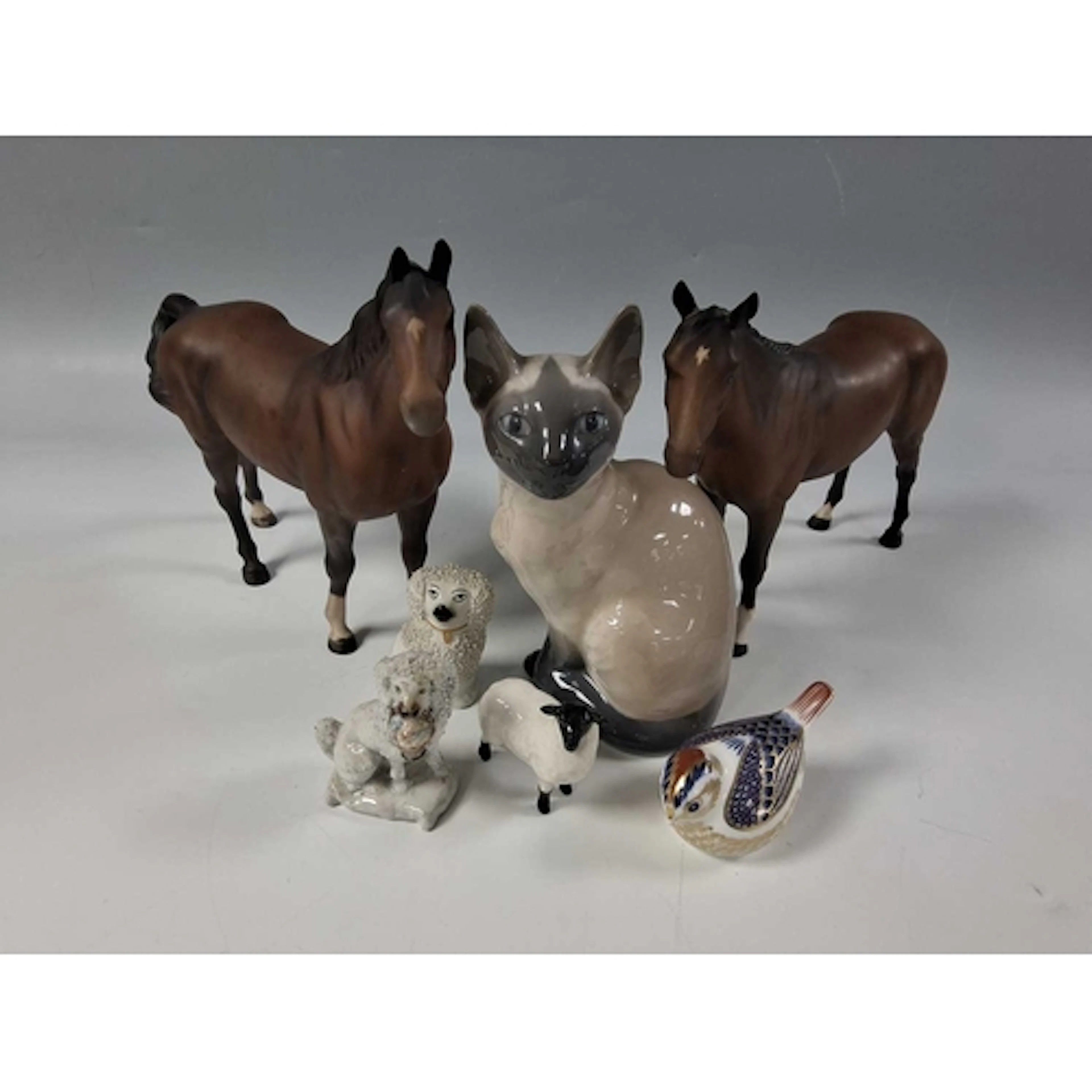 A GROUP OF ANIMAL FIGURINES to include a Royal Copenhagen Pe...