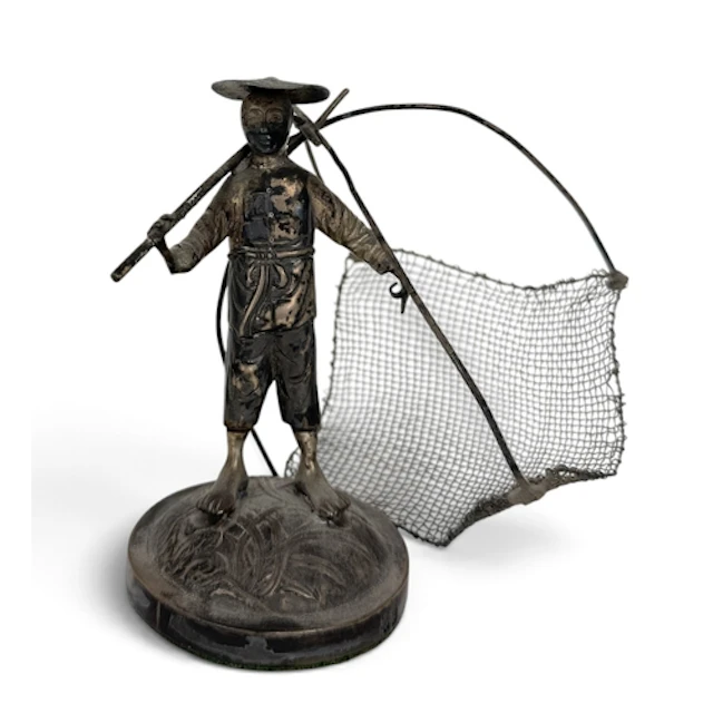 A WEIGHTED CHINESE SILVER FIGURE OF A FISHERMAN WITH NET On ...