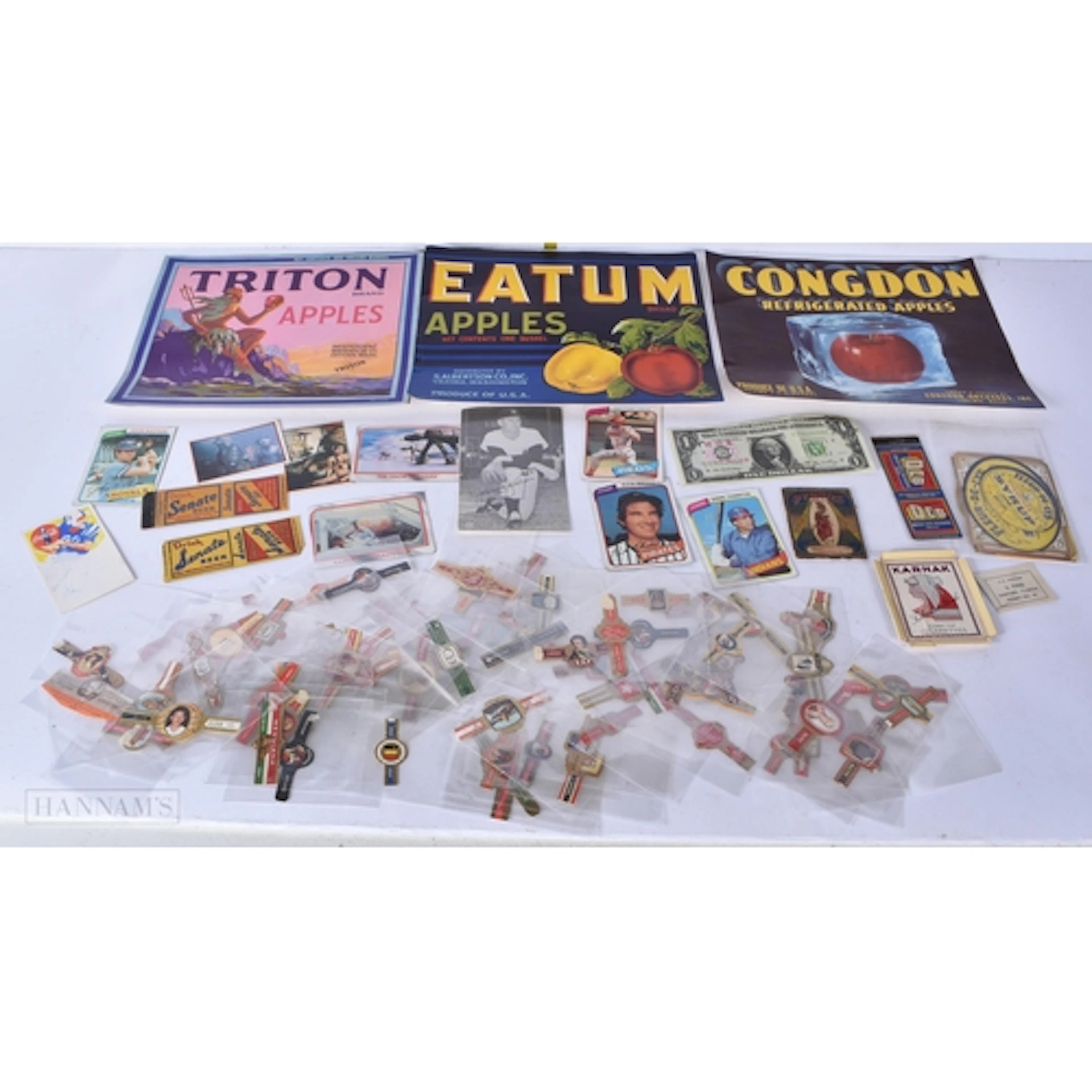 A collection of vintage American baseball cards, cigar label...