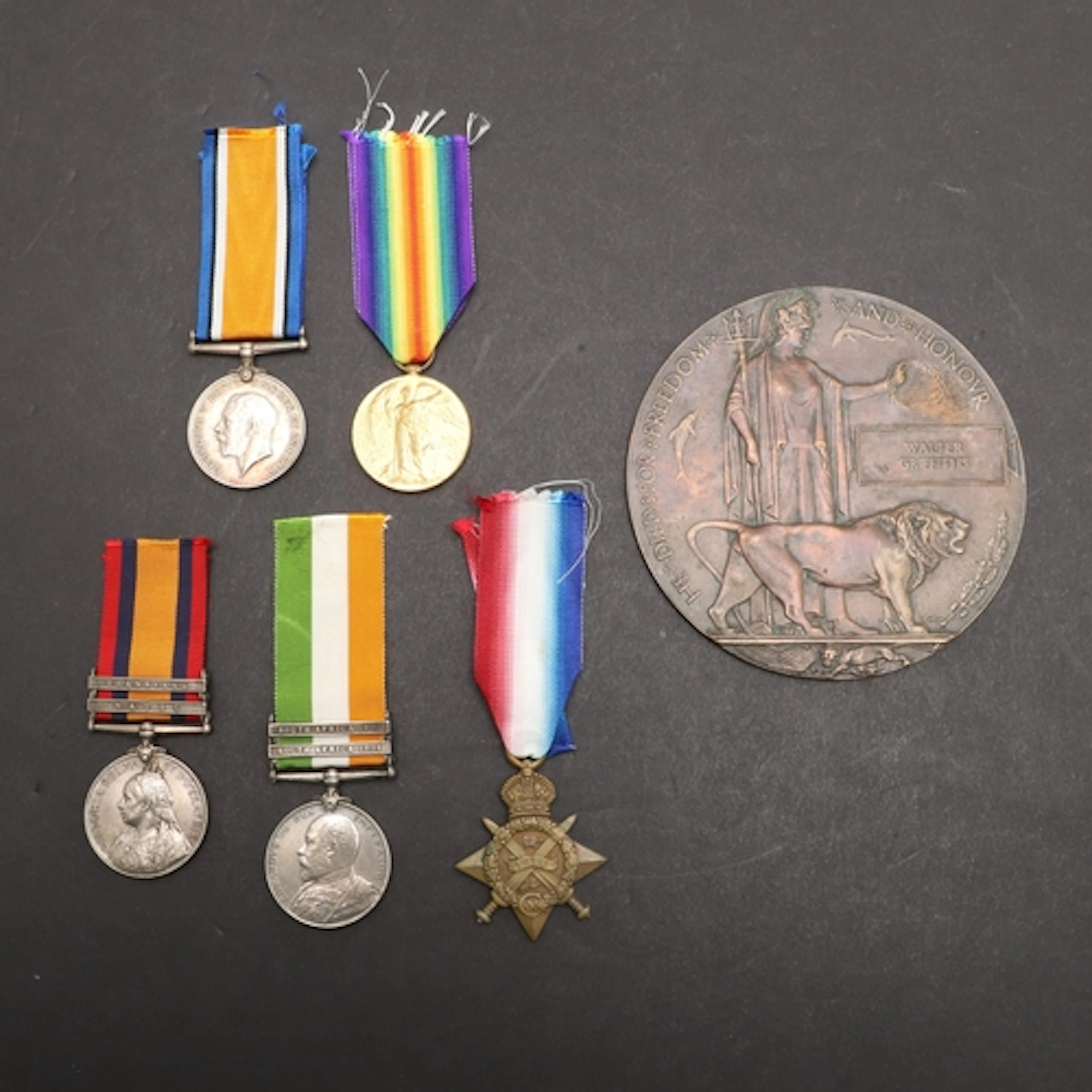 A BOER AND FIRST WORLD WAR FATALITY GROUP OF FIVE AND PLAQUE...