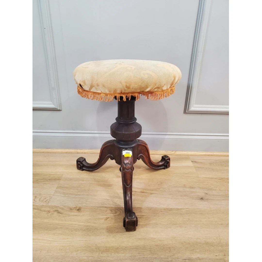 A walnut framed piano Stool, 1ft 7" H, (R2).