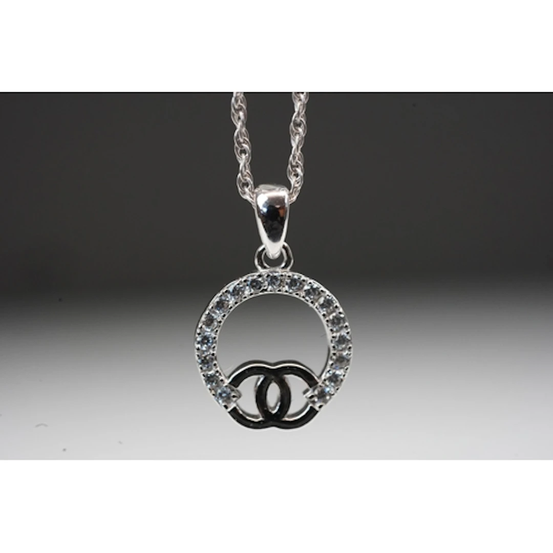 Silver designer style pendant necklace