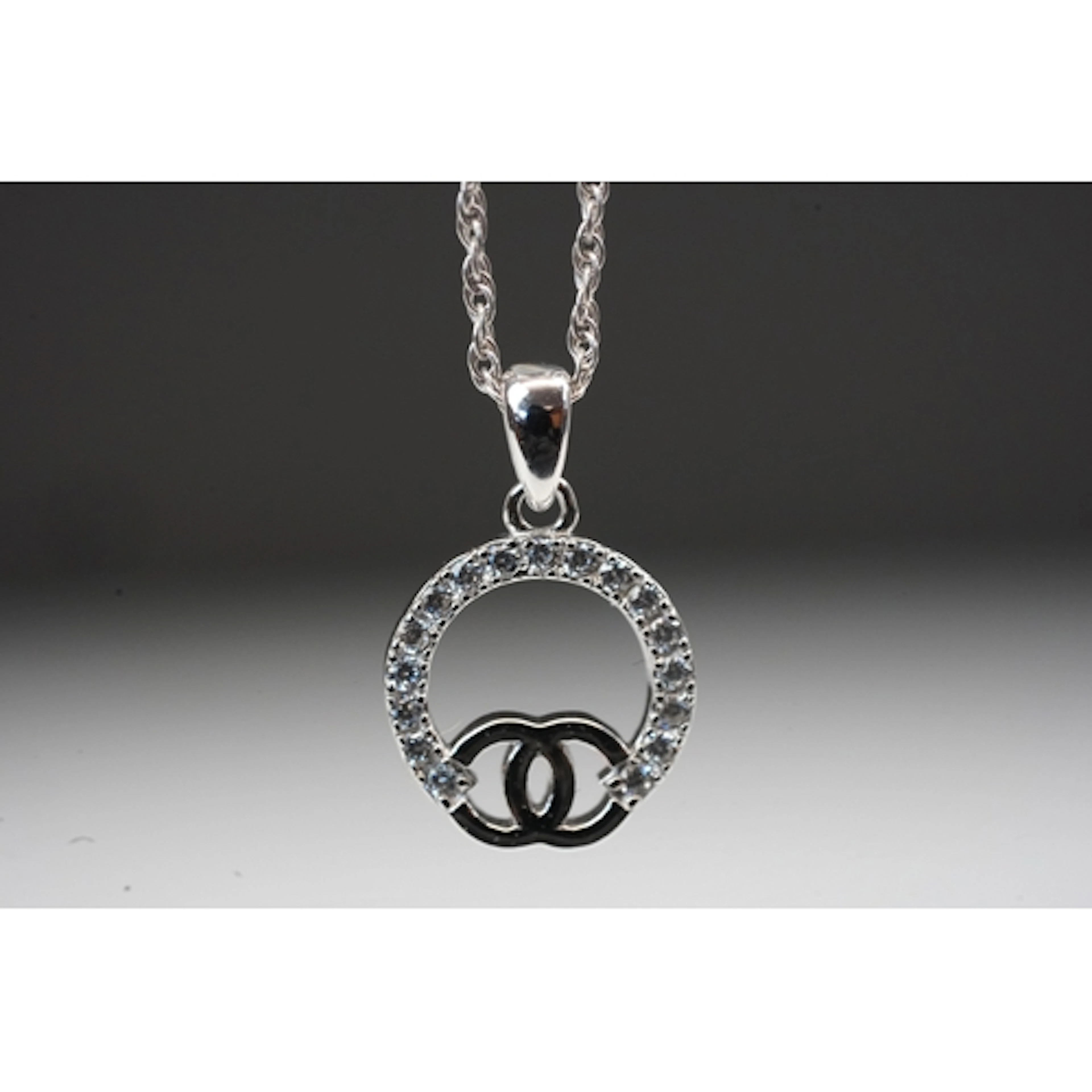 Silver designer style pendant necklace