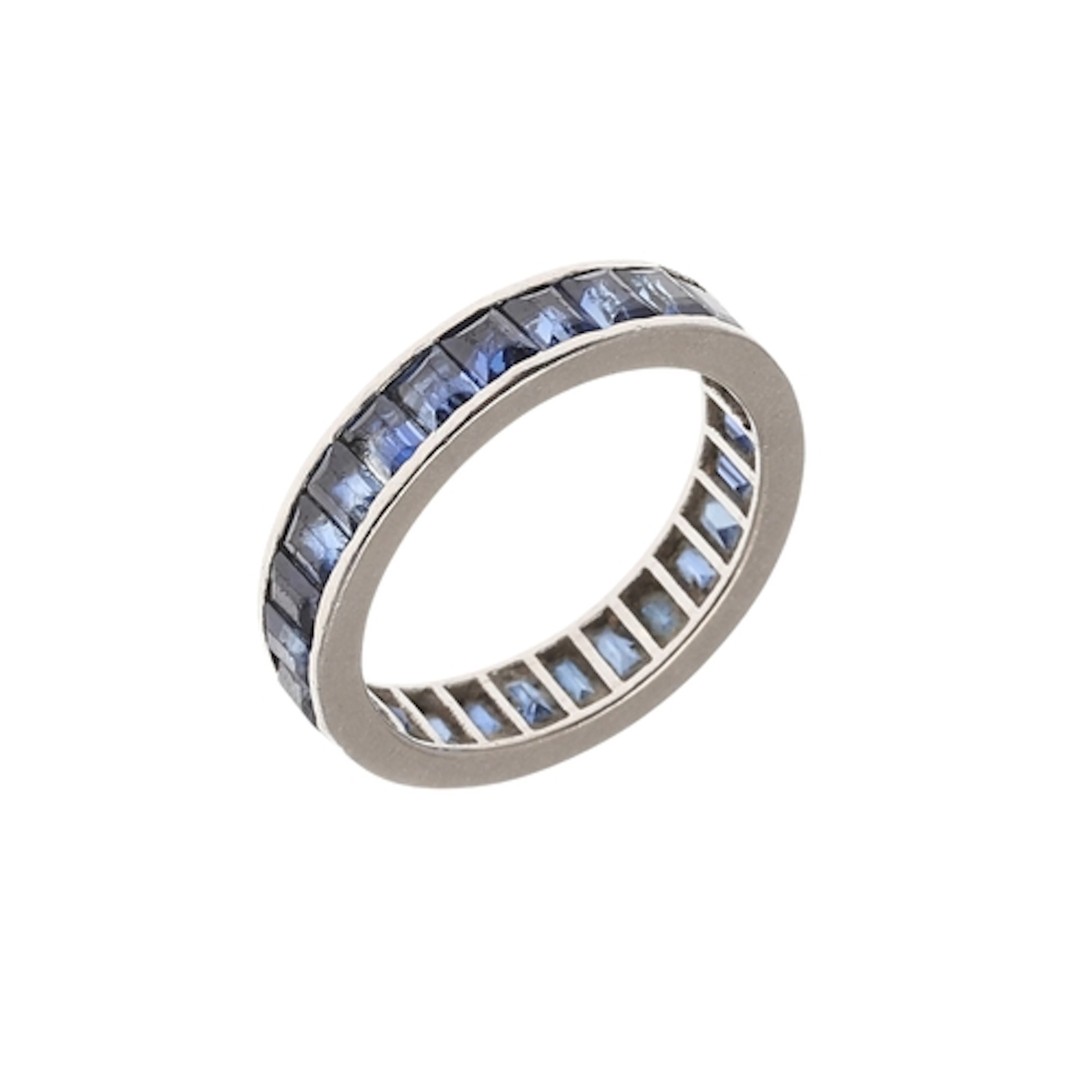 A SAPPHIRE FULL CIRCLE ETERNITY RING. mounted with calibre-c...