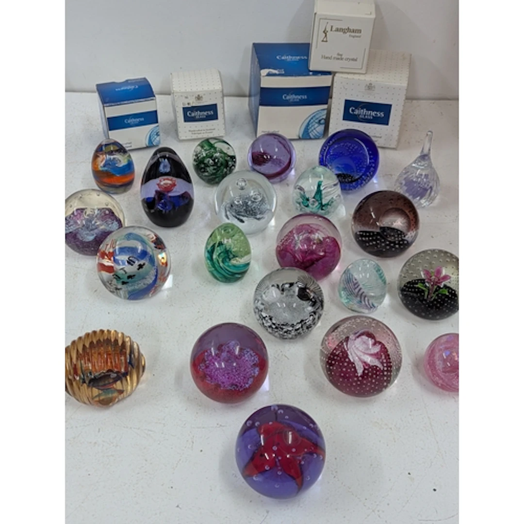 A collection mainly Caithness glass paper weights, some exam...