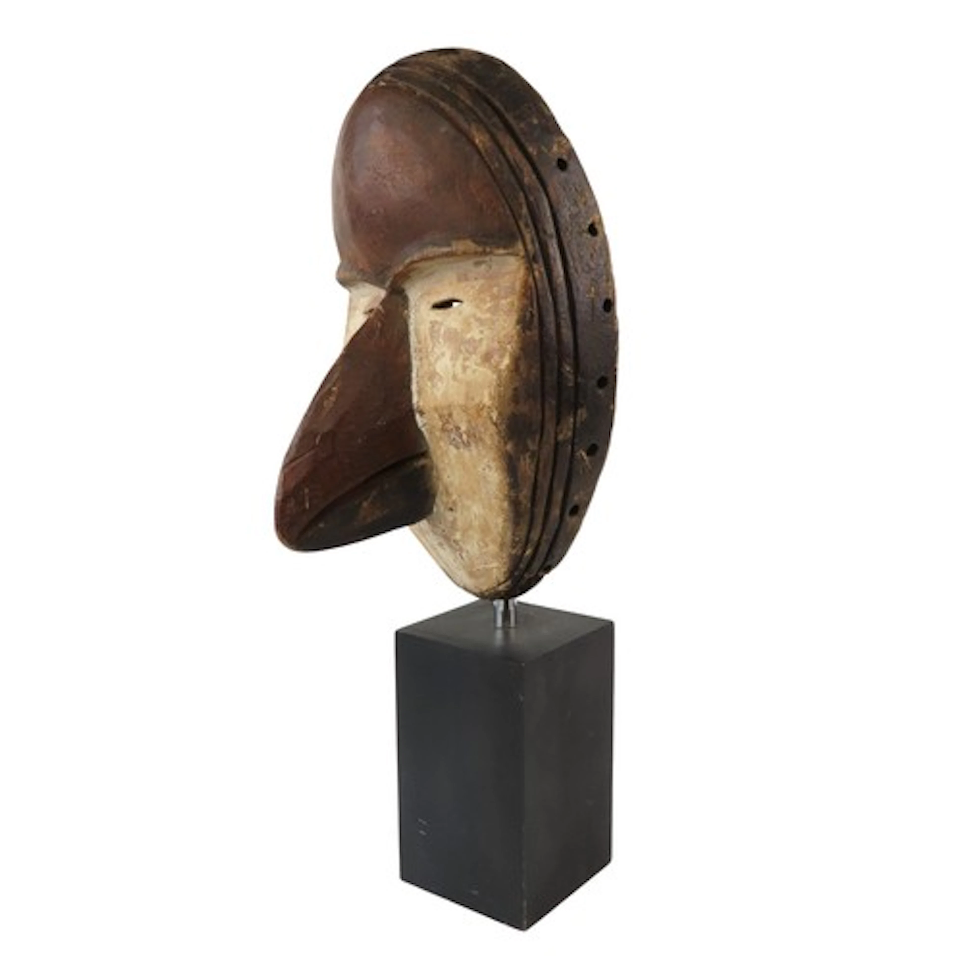 A FANG MASK the face with small eyes and pronounced nose and...
