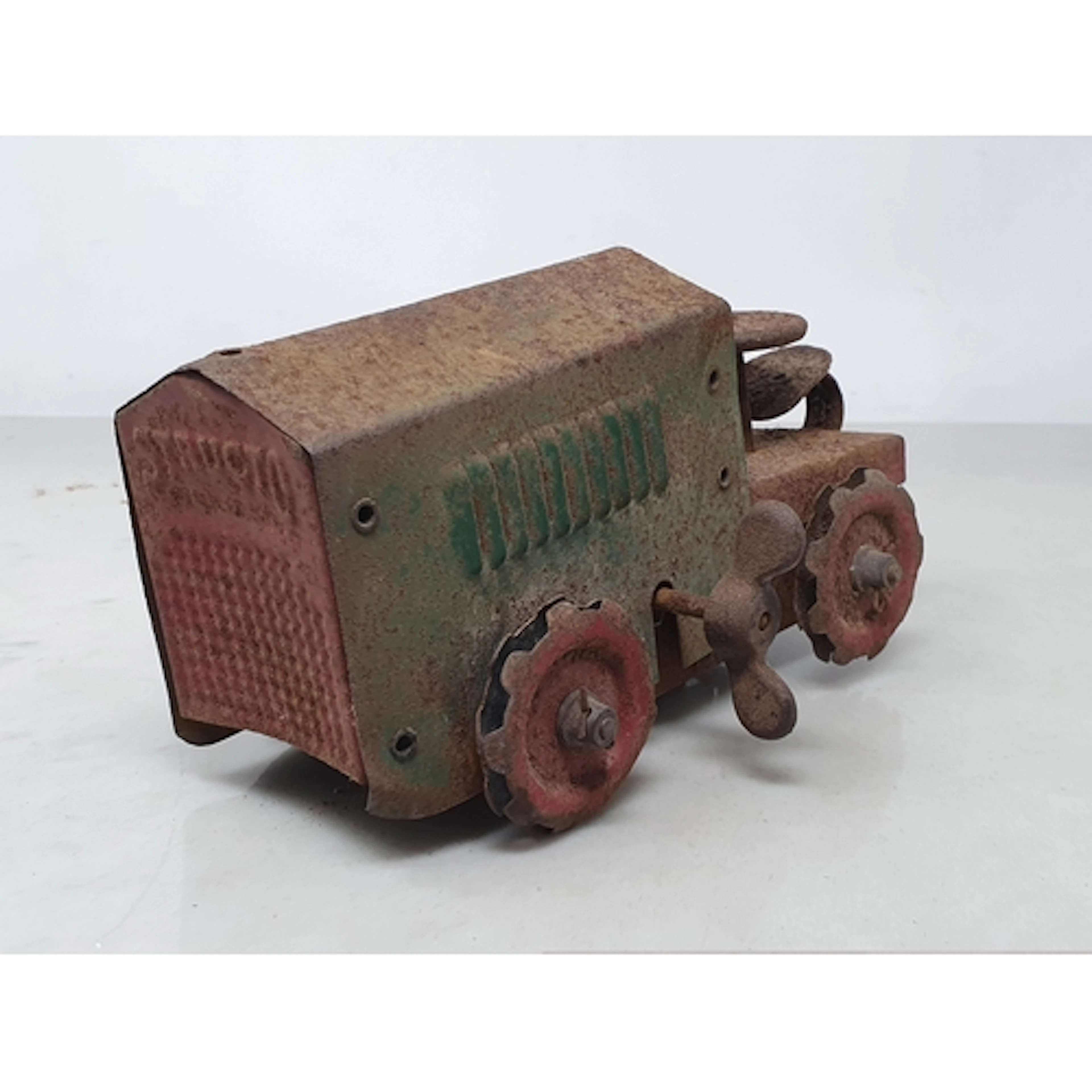 A Structo Toys metal Caterpillar Tractor in need of restorat...