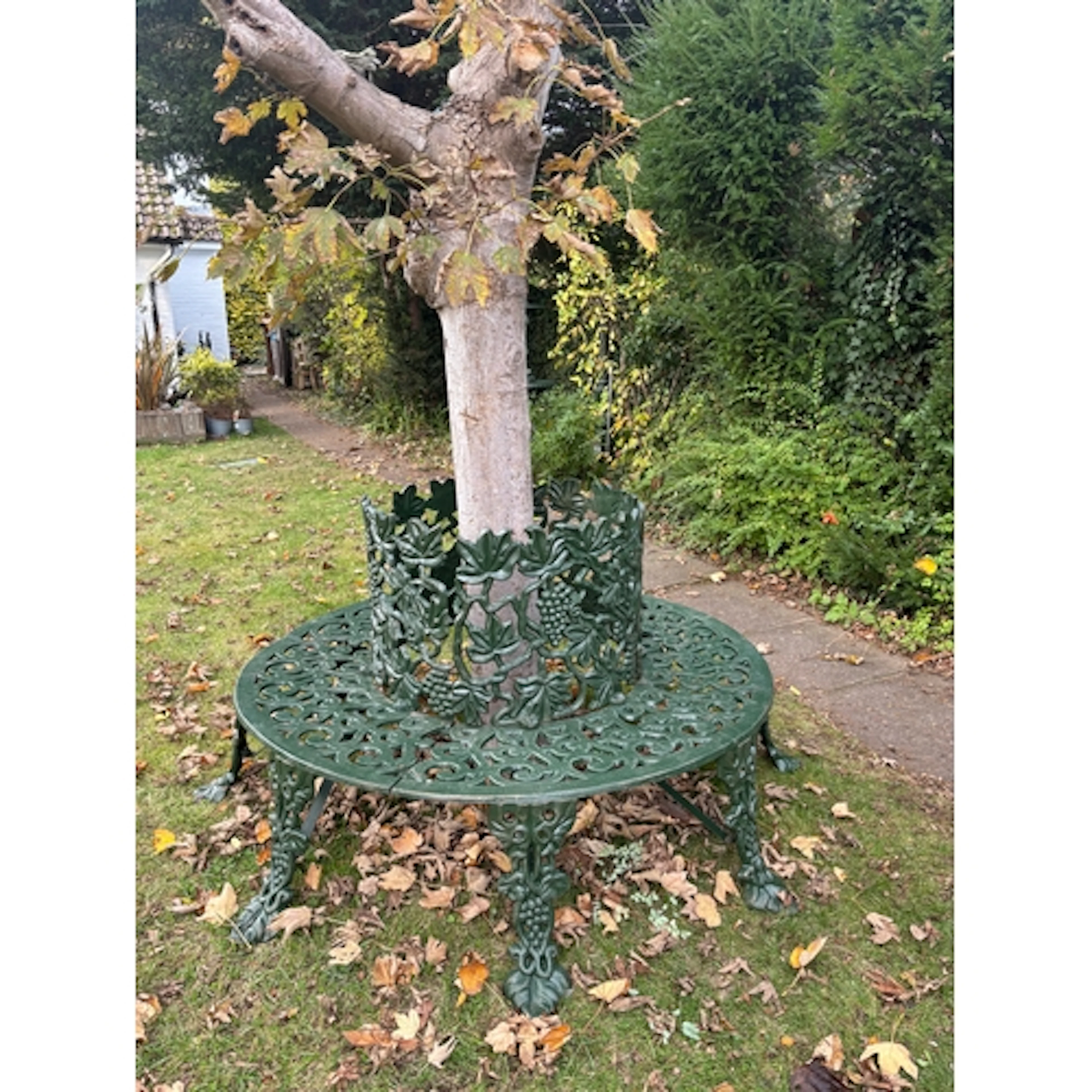 A magnificent and highly decorative circular cast iron tree ...