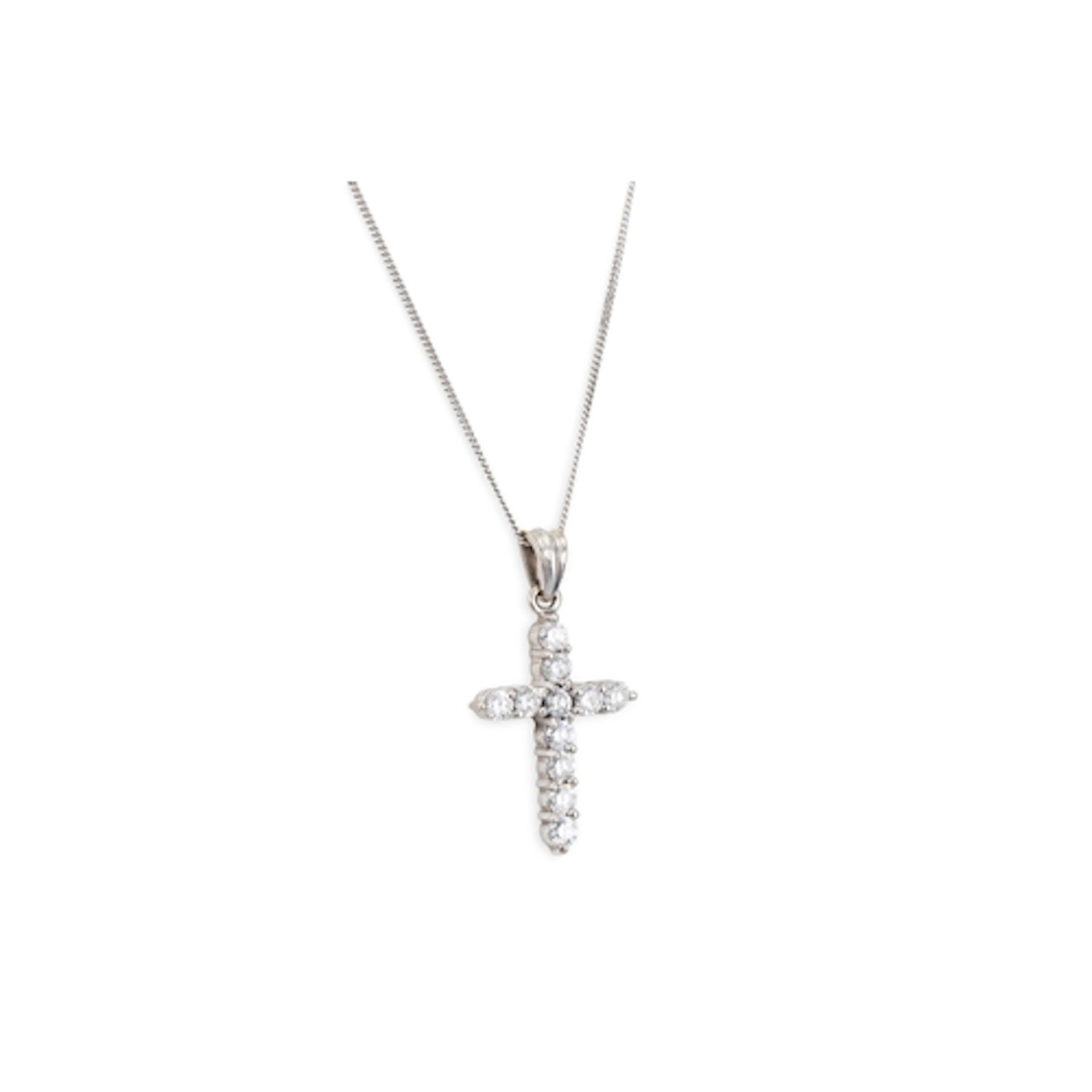 A DIAMOND SET CROSS, the brilliant cut diamonds mounted in 1...