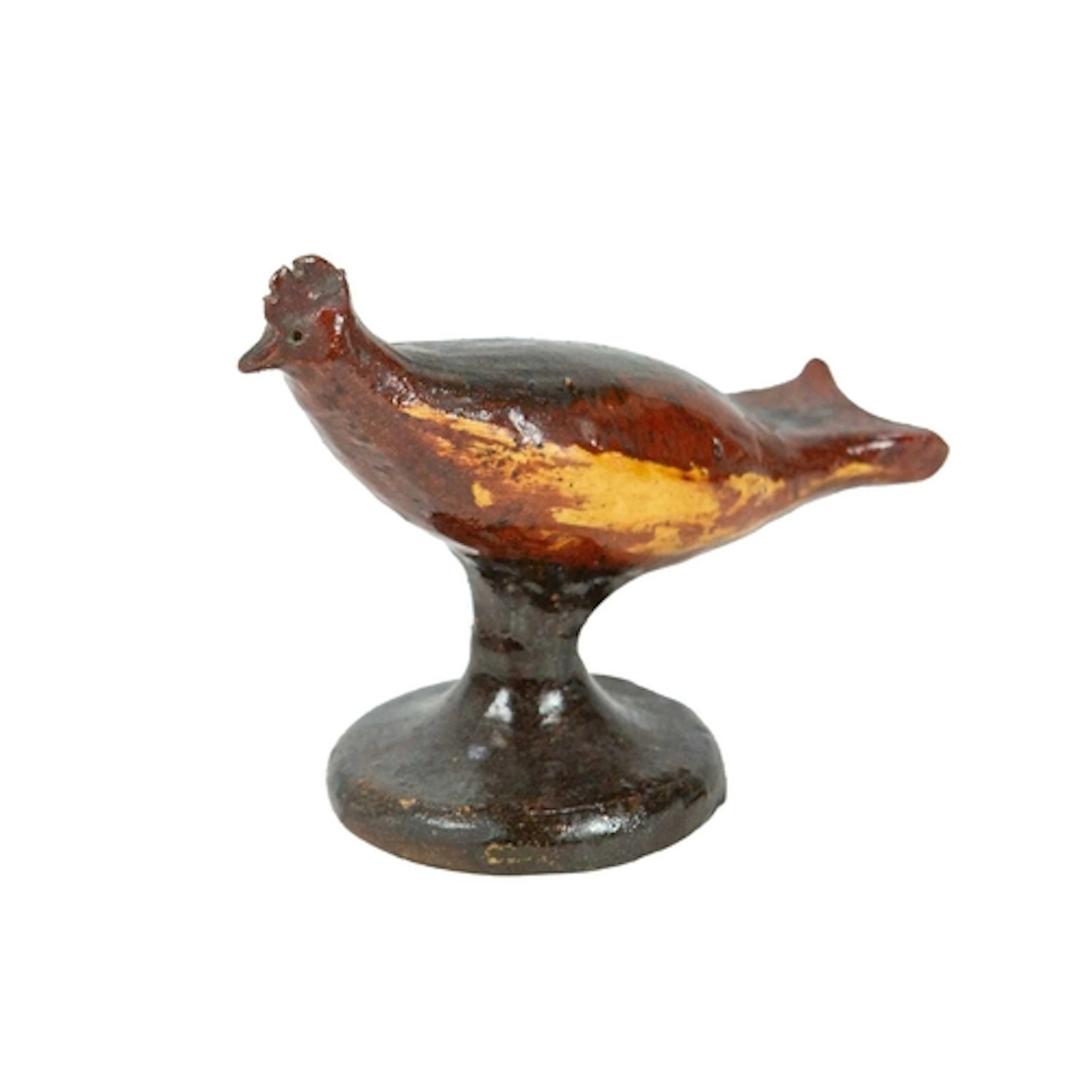 A primitive slipware pottery bird whistle. Early-mid 19th ce...