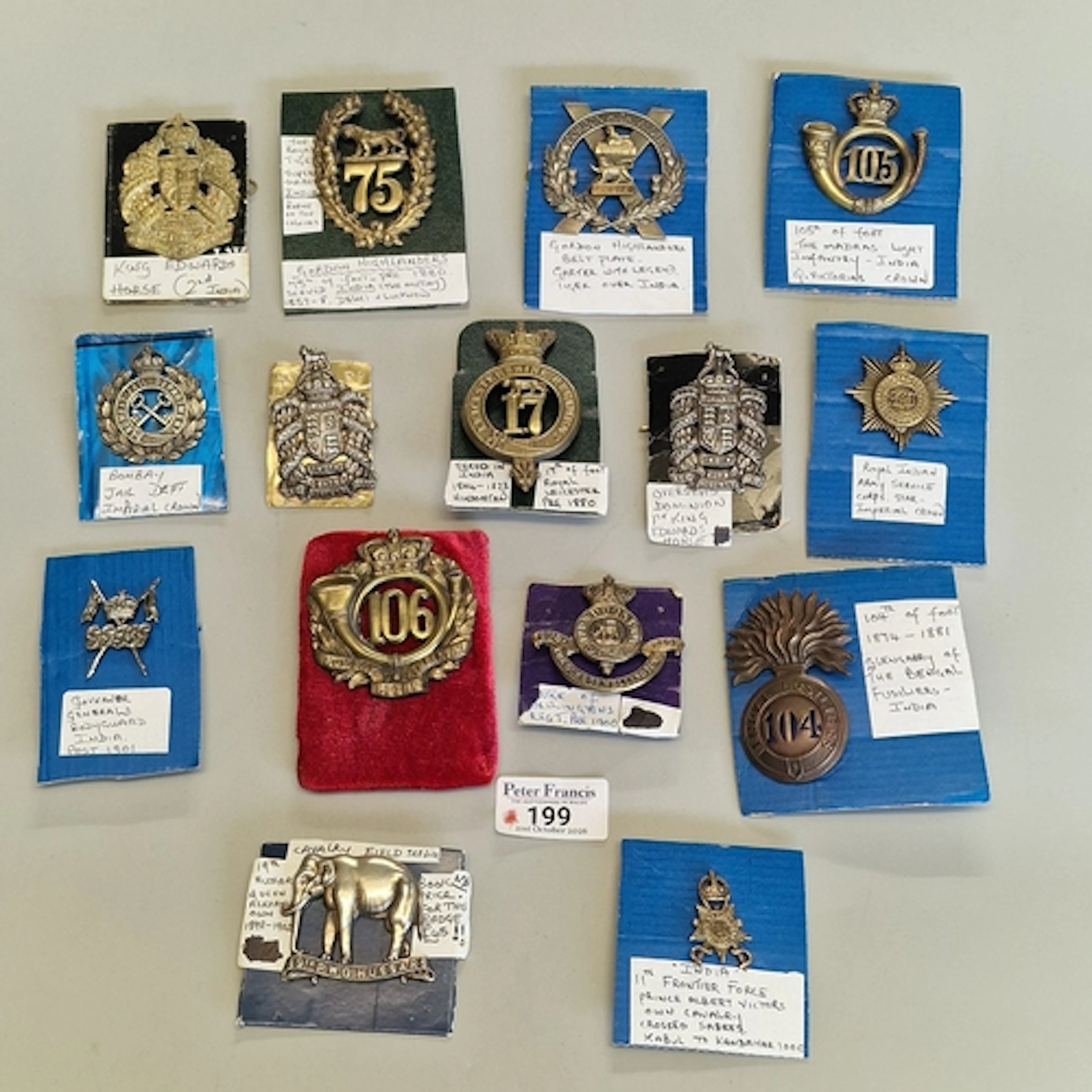 Collection of British/Indian military cap badges, including ...