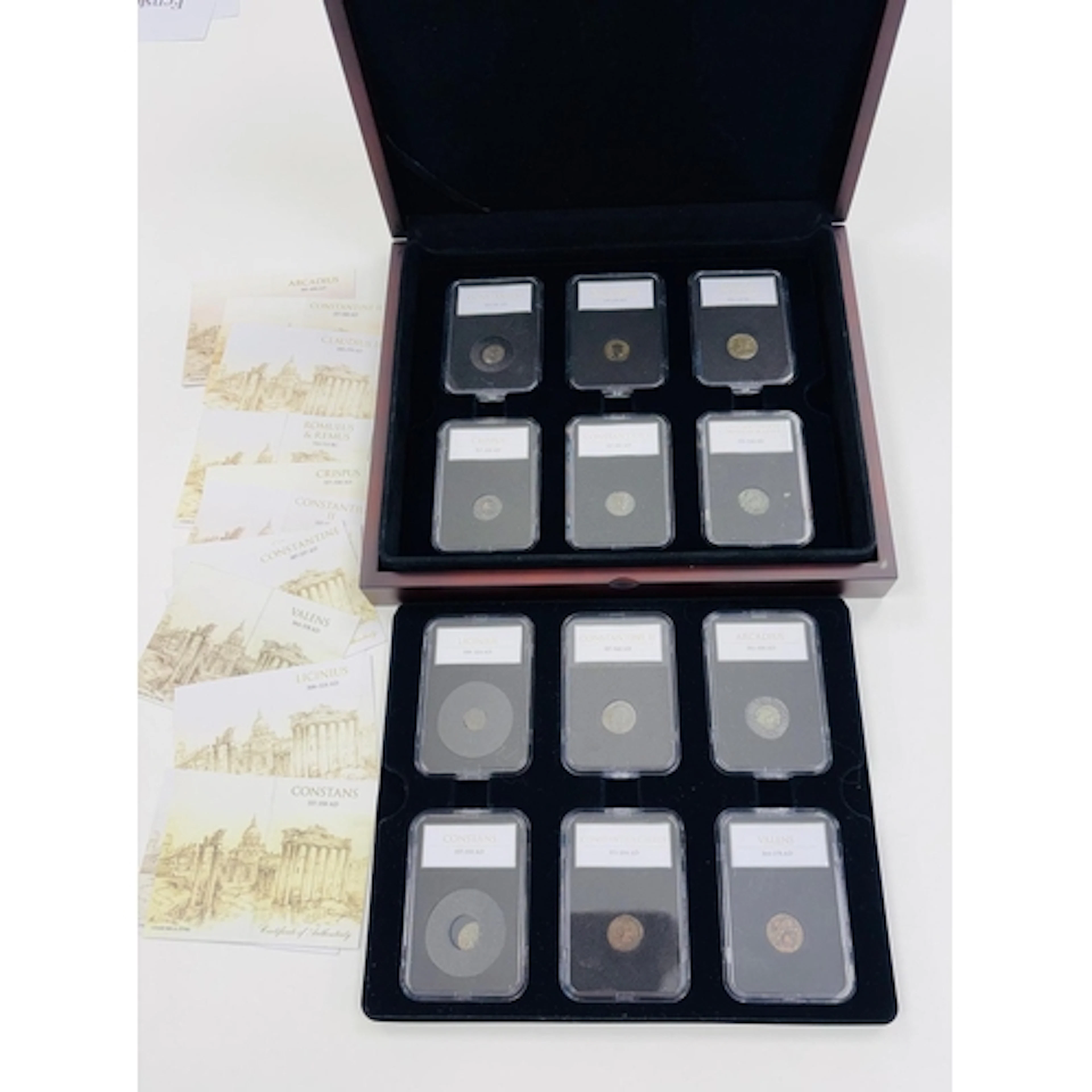 Roman coins. A collection of 12 Roman coins, all identified ...