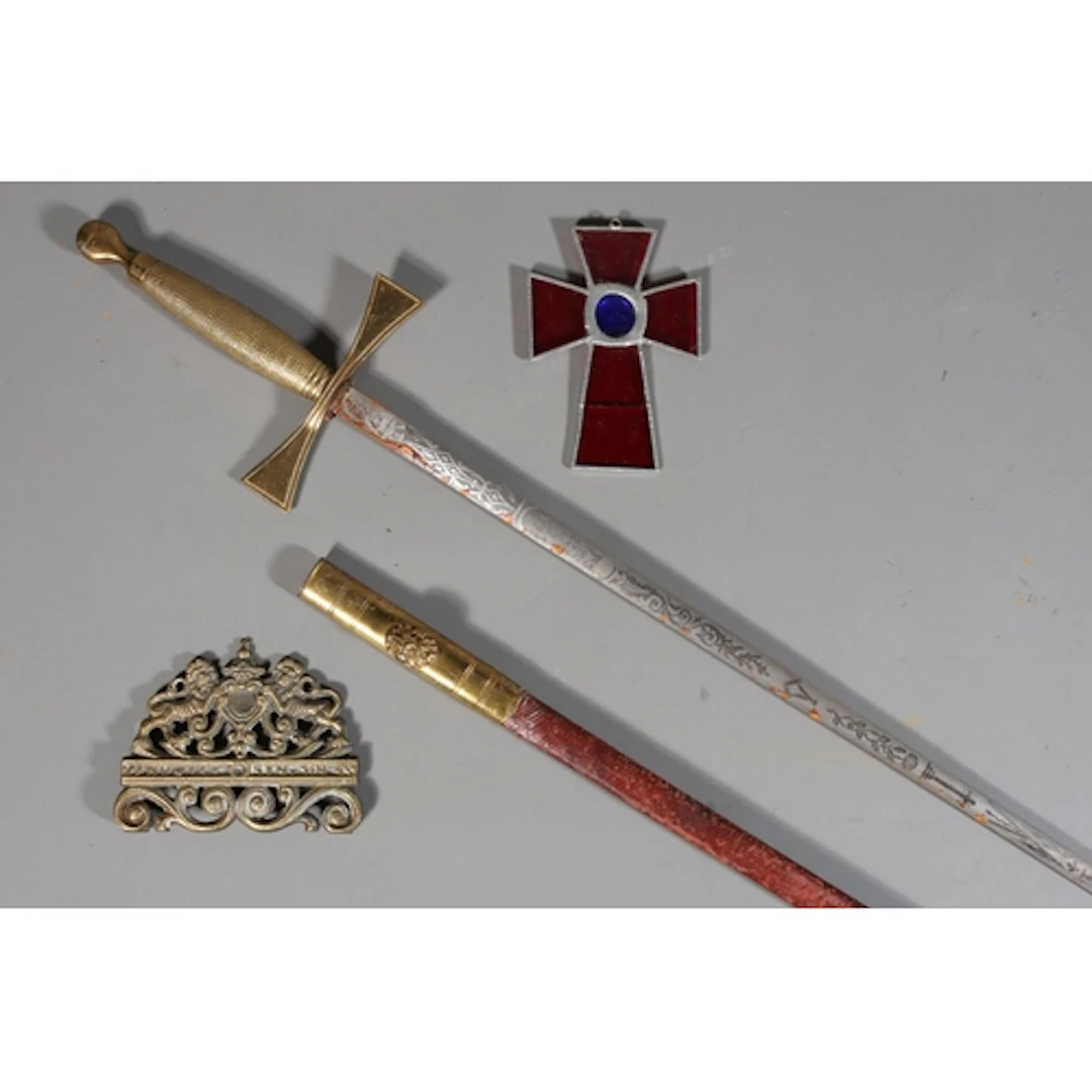 Stephen Simpson sword, a brass crest and a cruciform.