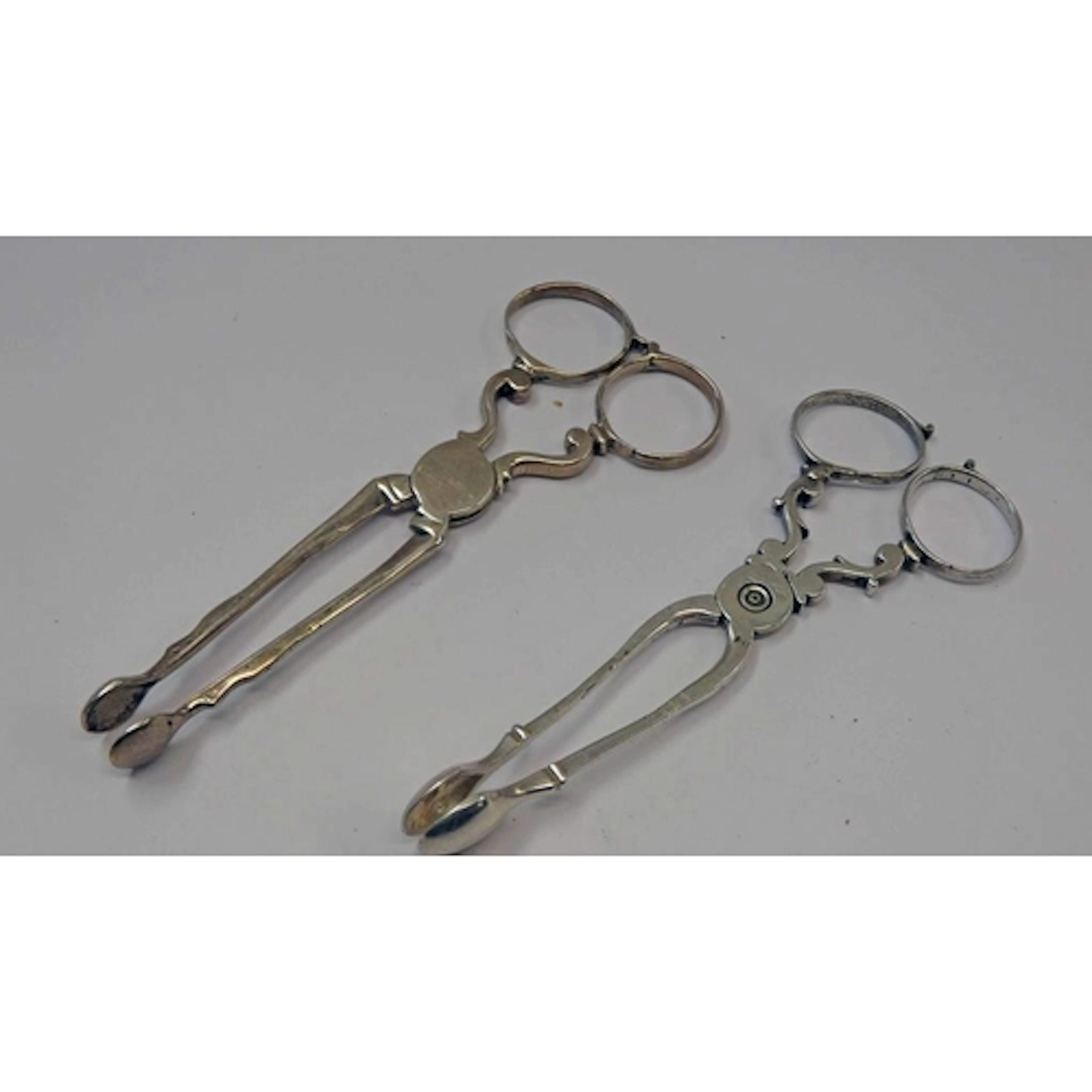 PAIR OF 18TH CENTURY SILVER SUGAR NIPS, MARKS RUBBED & 1 OTH...