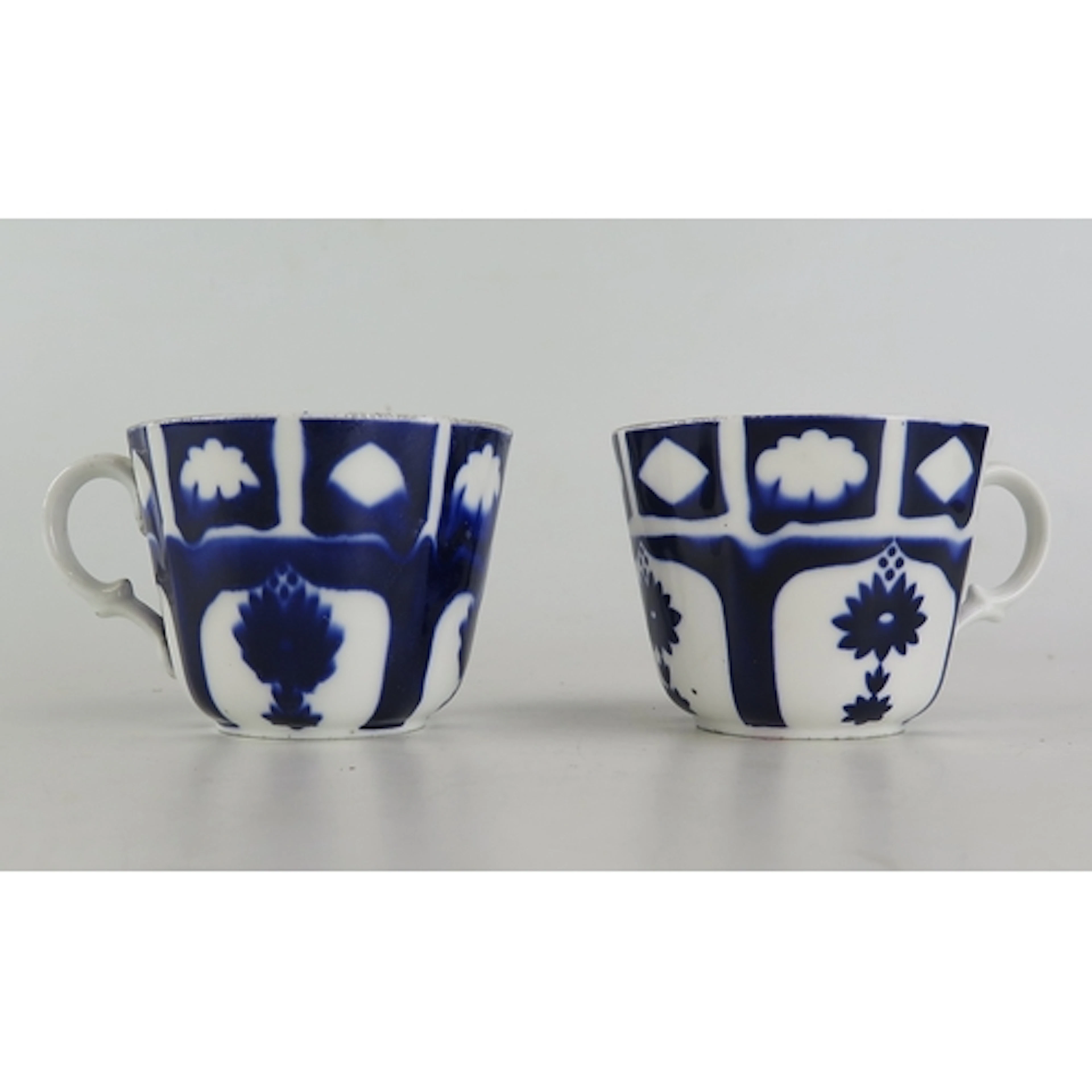 A pair of WWII German U-boat teacups, both marked for Bremer...