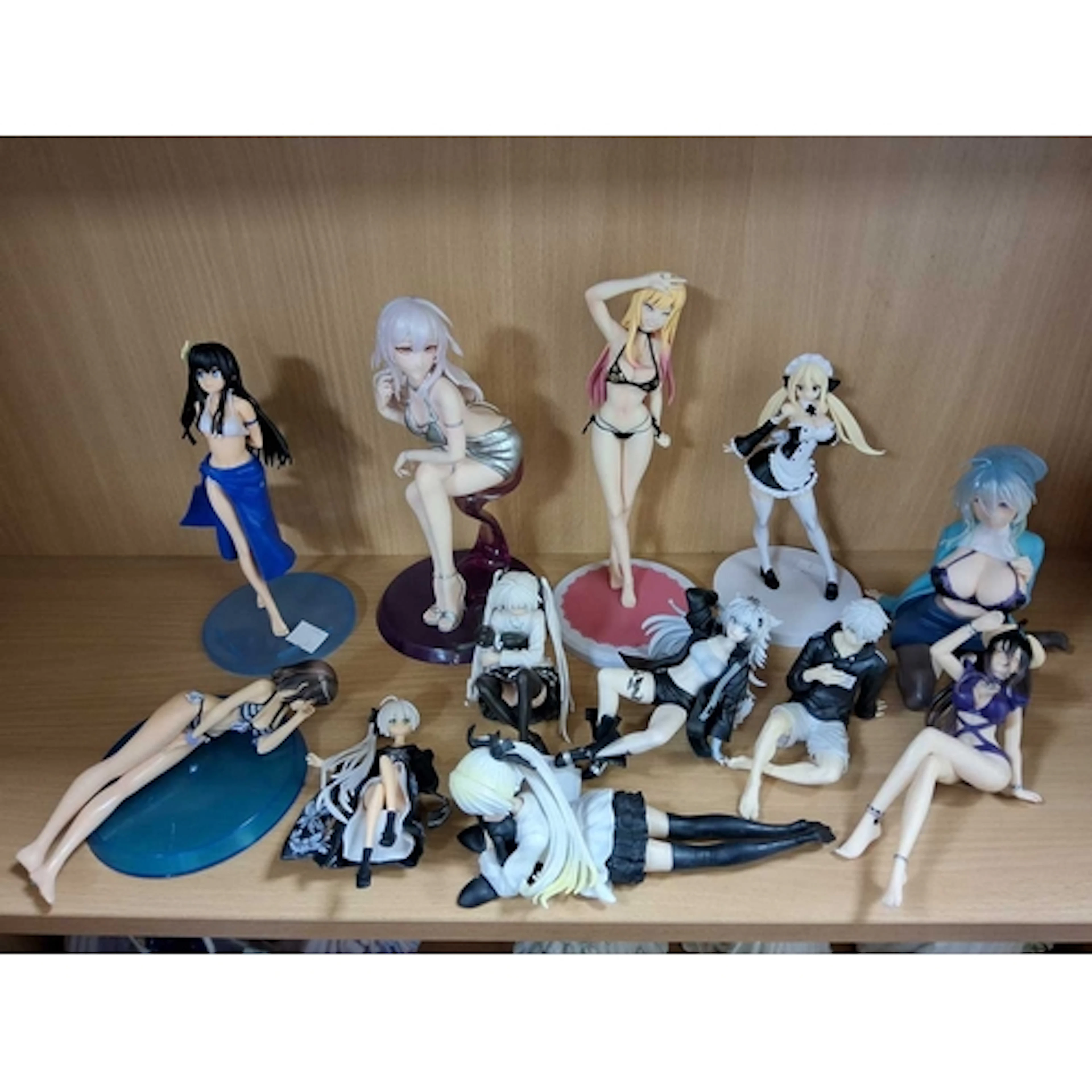 A GROUP OF TWELVE PVC ANIME FIGURES INCLUDING FIGURES FROM Y...