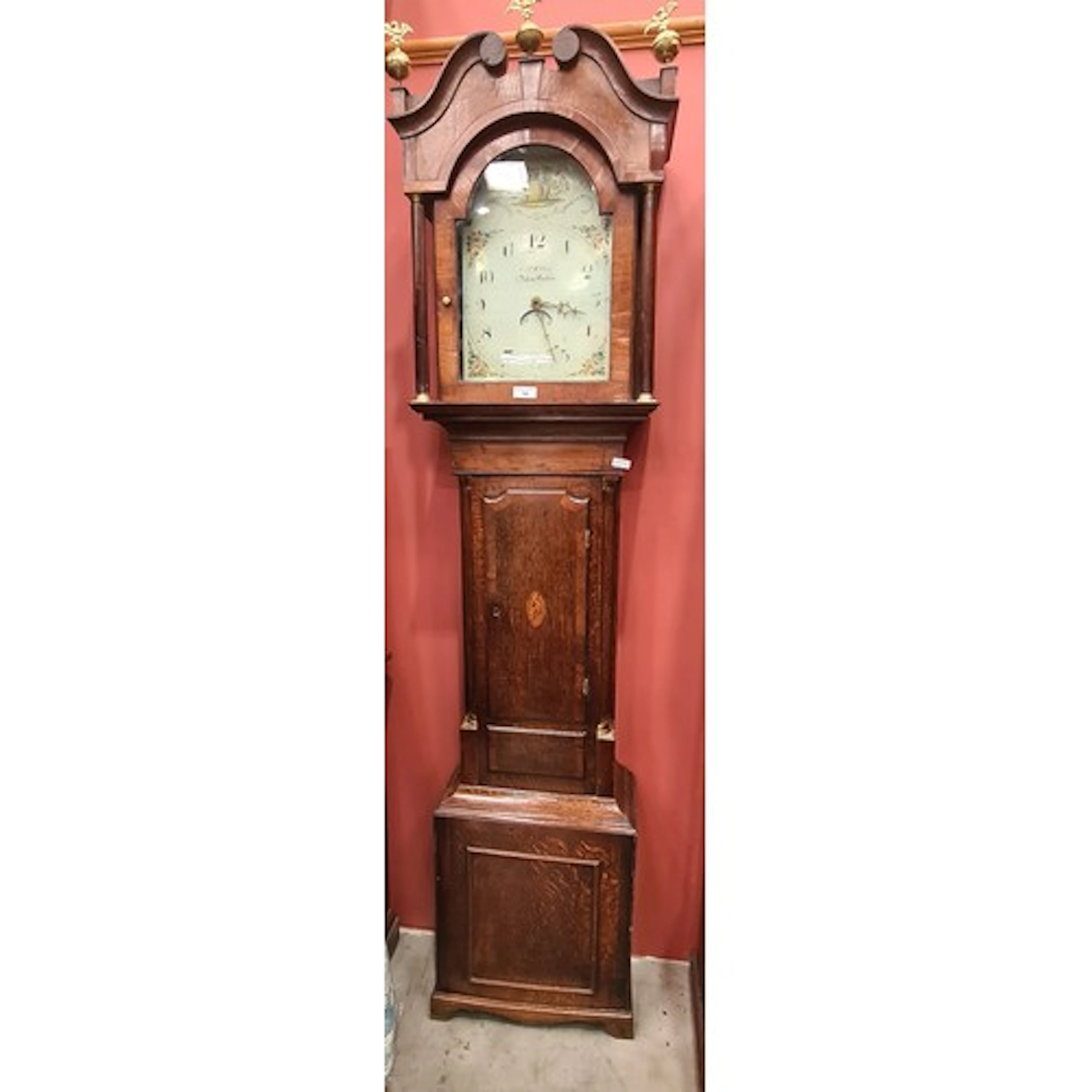 An antique oak Longcase Clock with painted arched dial inscr...