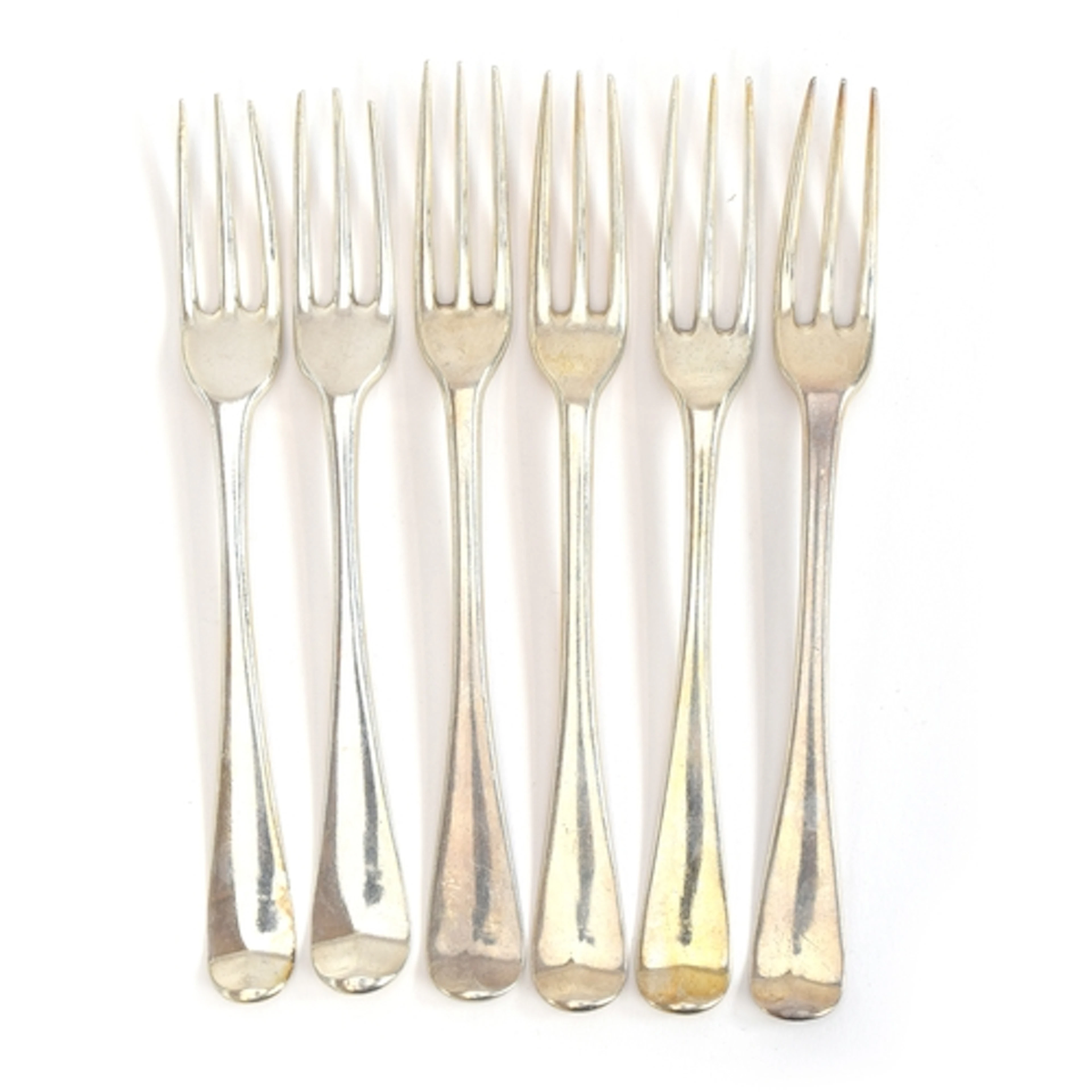 A matched set of six Hanoverian pattern three pronged fruit ...