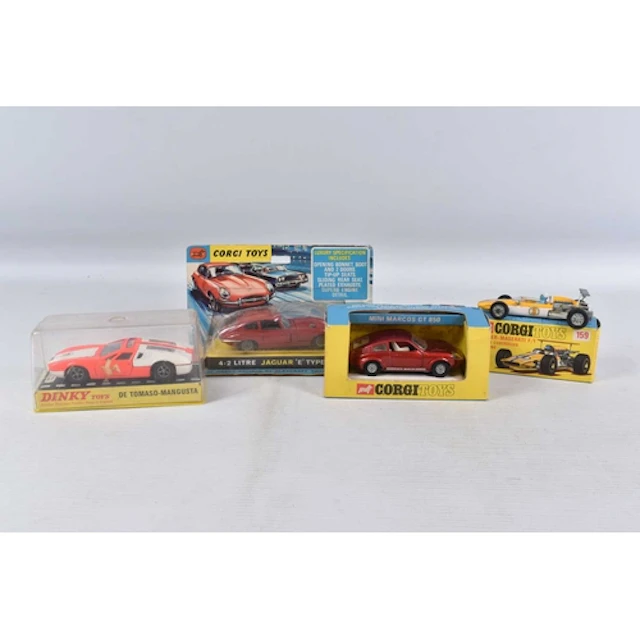 FOUR BOXED DIECAST VEHICLES, to include a Blister pack Corgi...