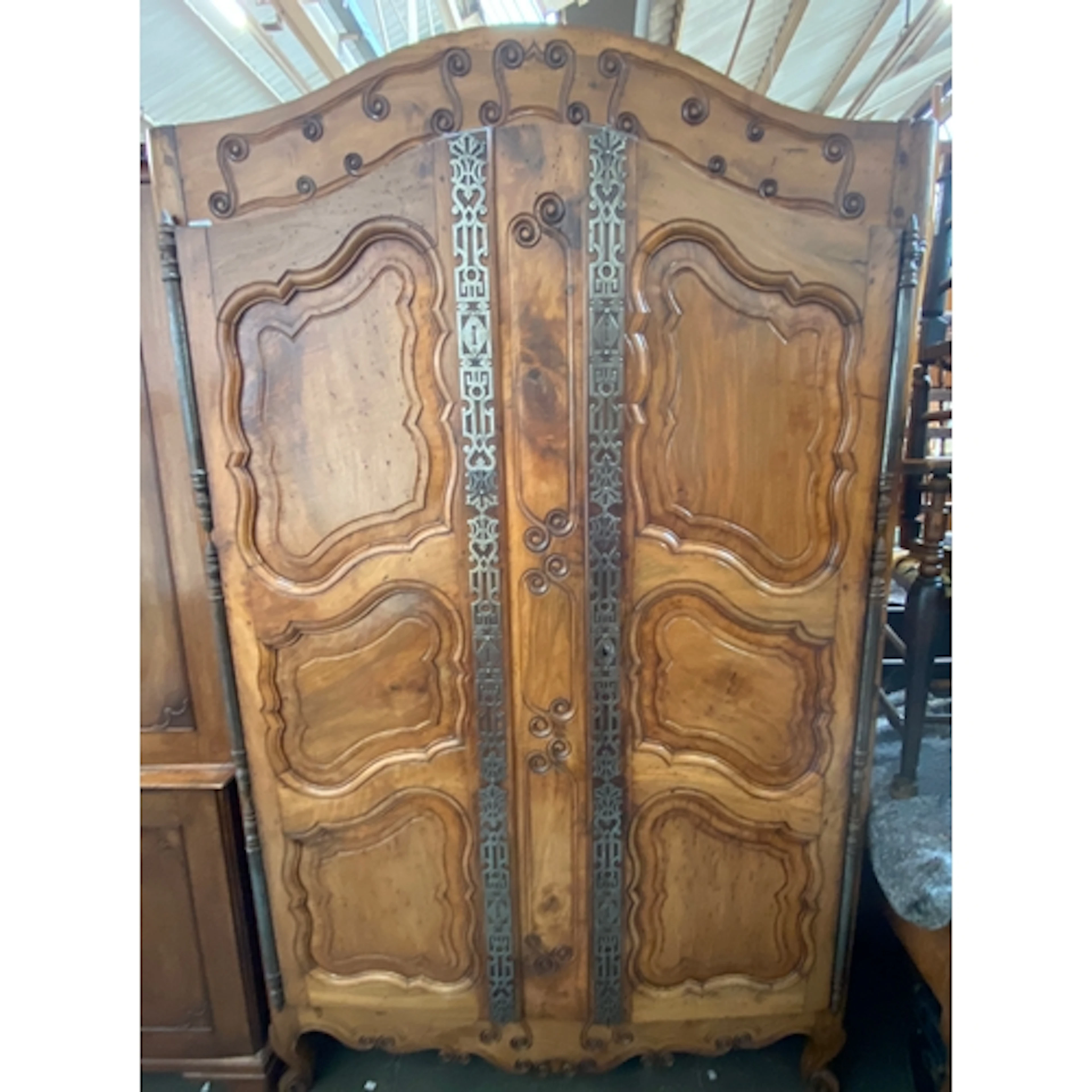 A large 18th/19th century French armoire with a pair of a ca...