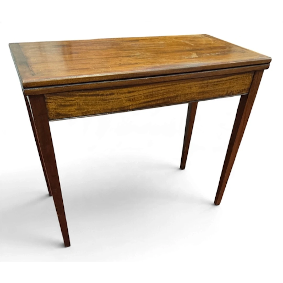 A late 19th Century Mahogany Foldover Table on square tapere...