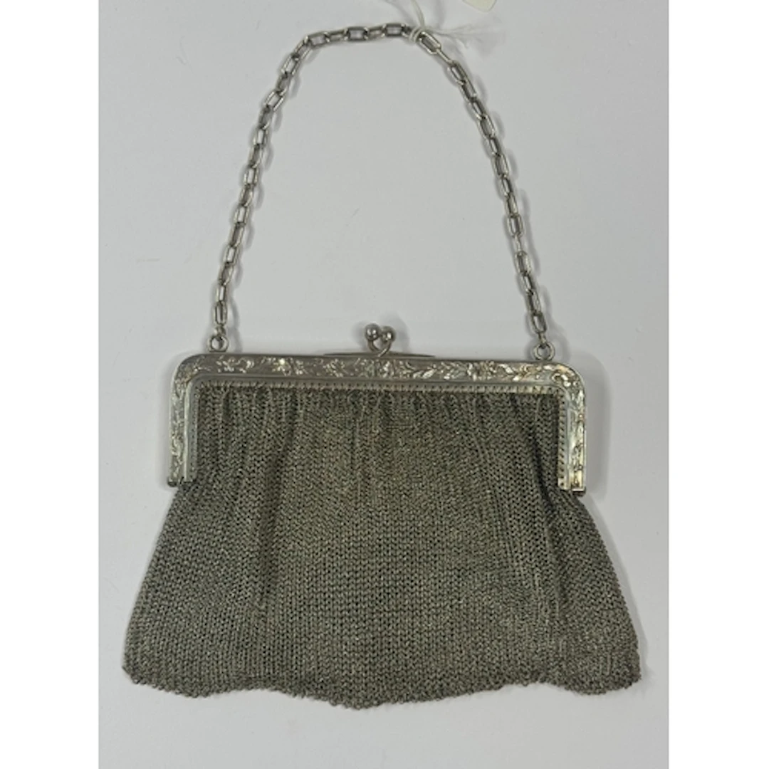 Silver: a sterling mesh handbag, import marks for London 191...
