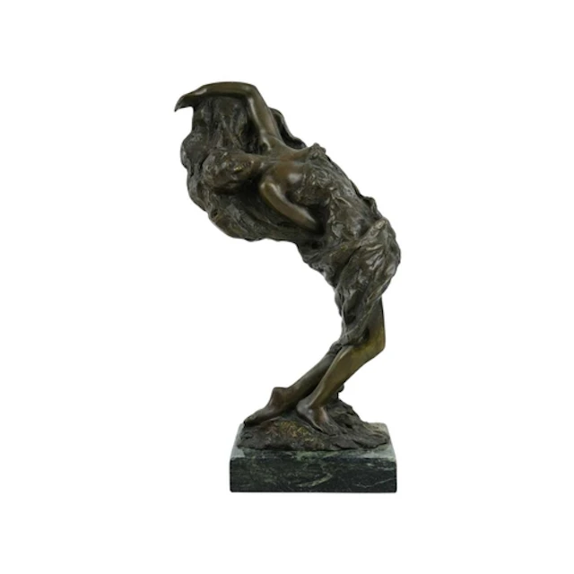 B. C. ZHENG (20th Century). A bronze sculpture of a wind-swe...