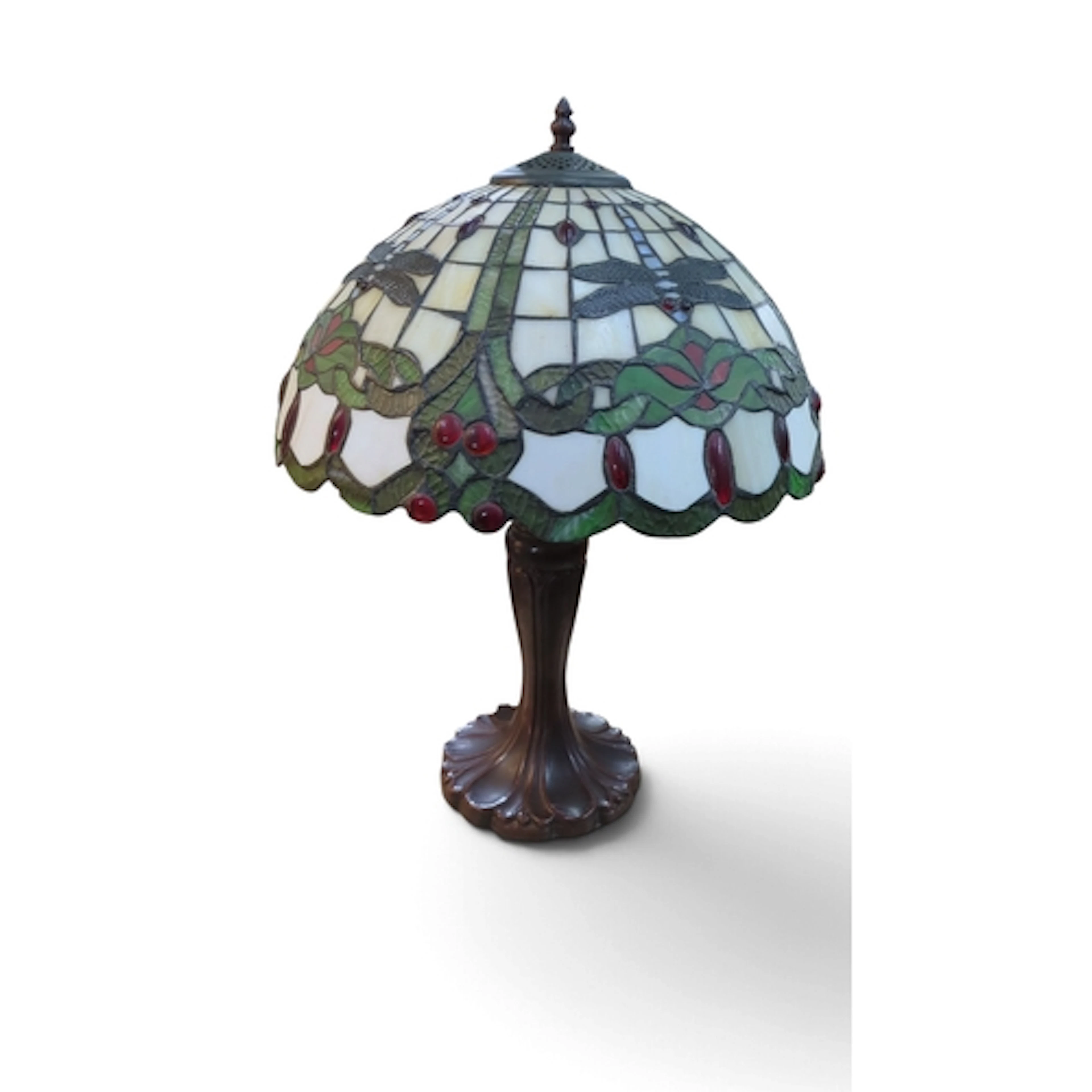 Tiffany-style table lamp with a domed leaded-glass shade dep...