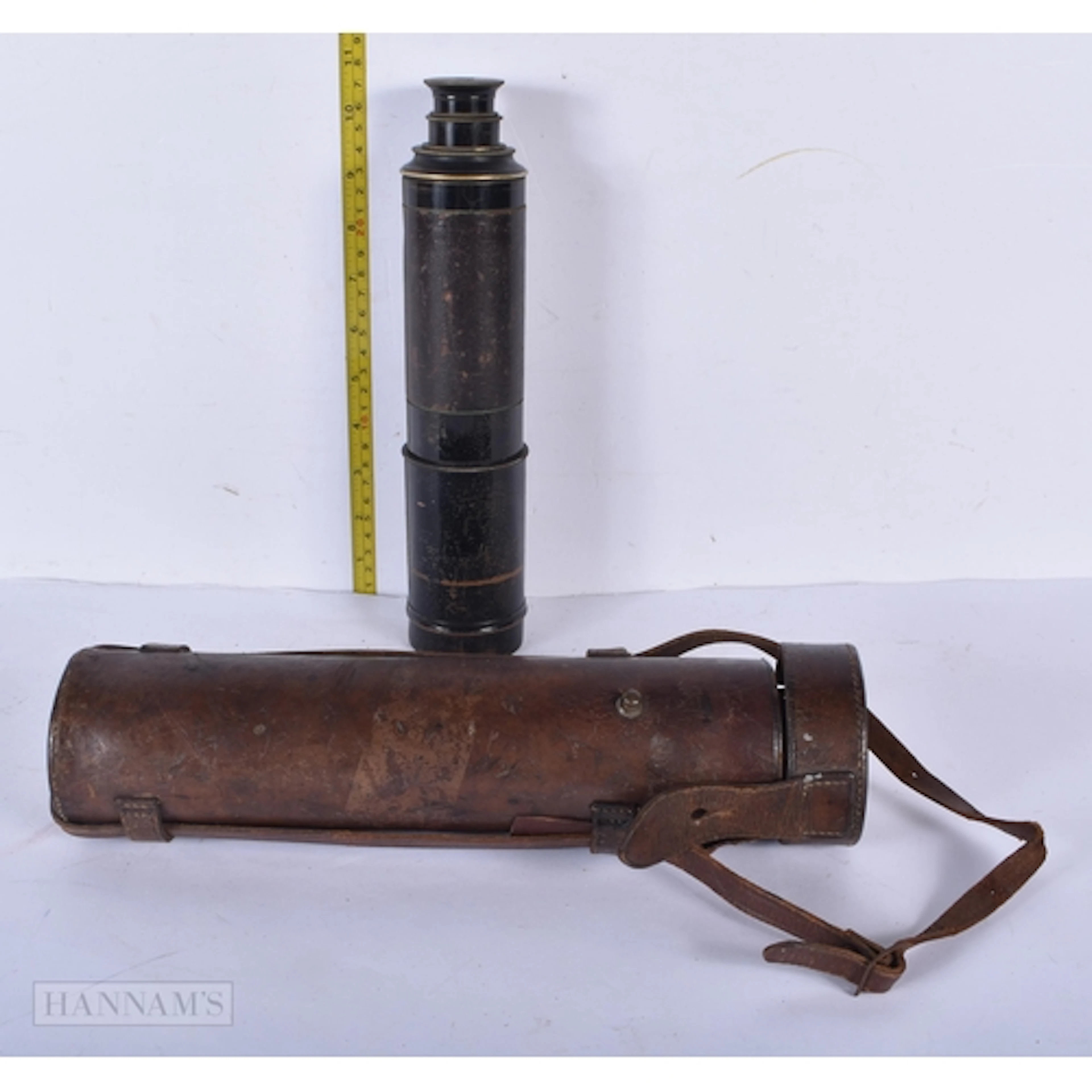 A leather cased military 4 draw telescope by W G Whiting of ...