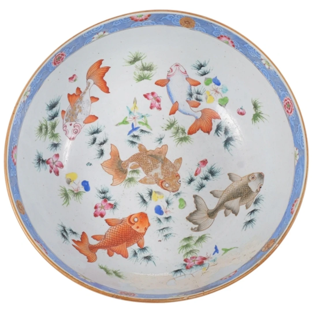 A Chinese bowl on foot with design of fish (repaired), 39cm ...