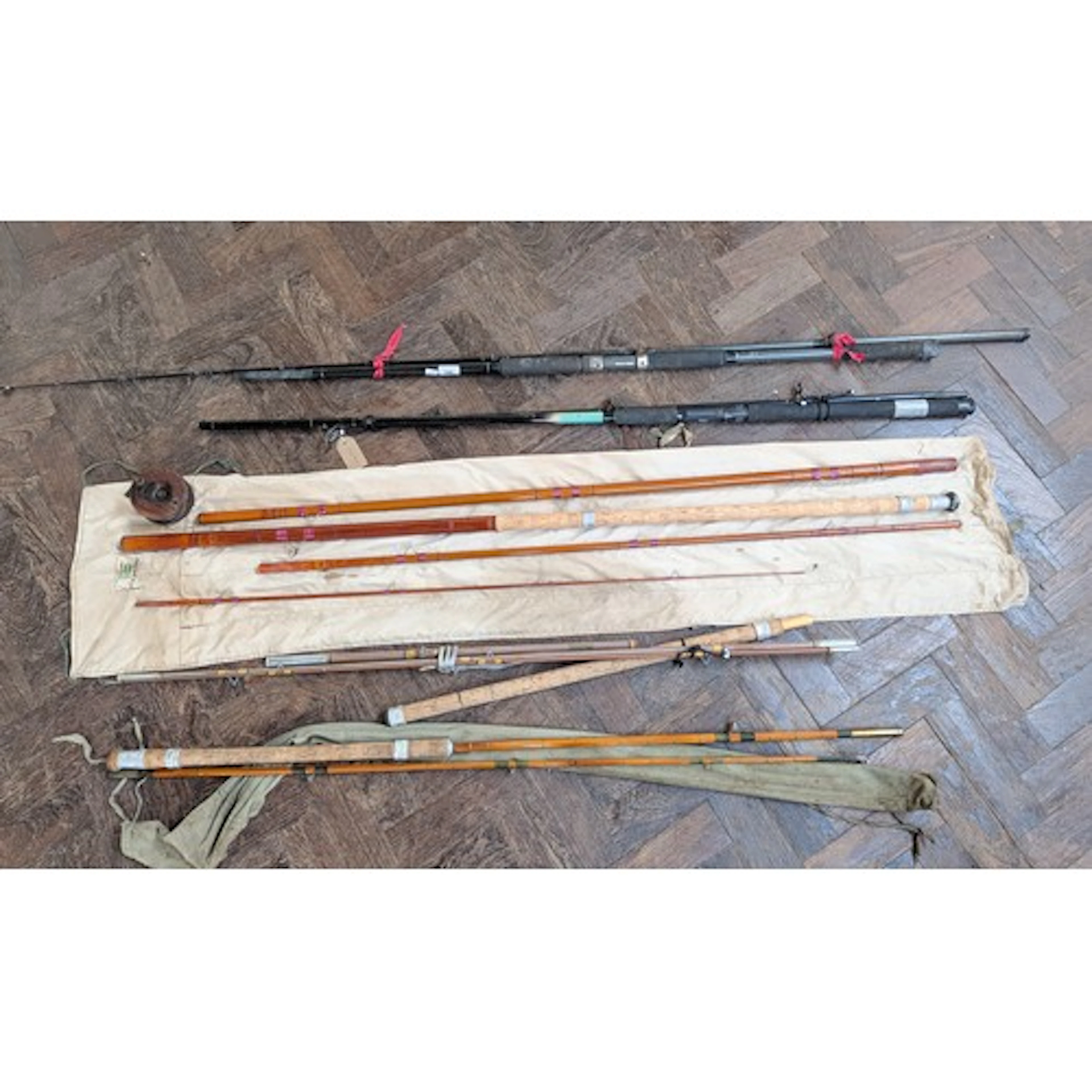 Five sea fishing rods to include three vintage ones, one bei...
