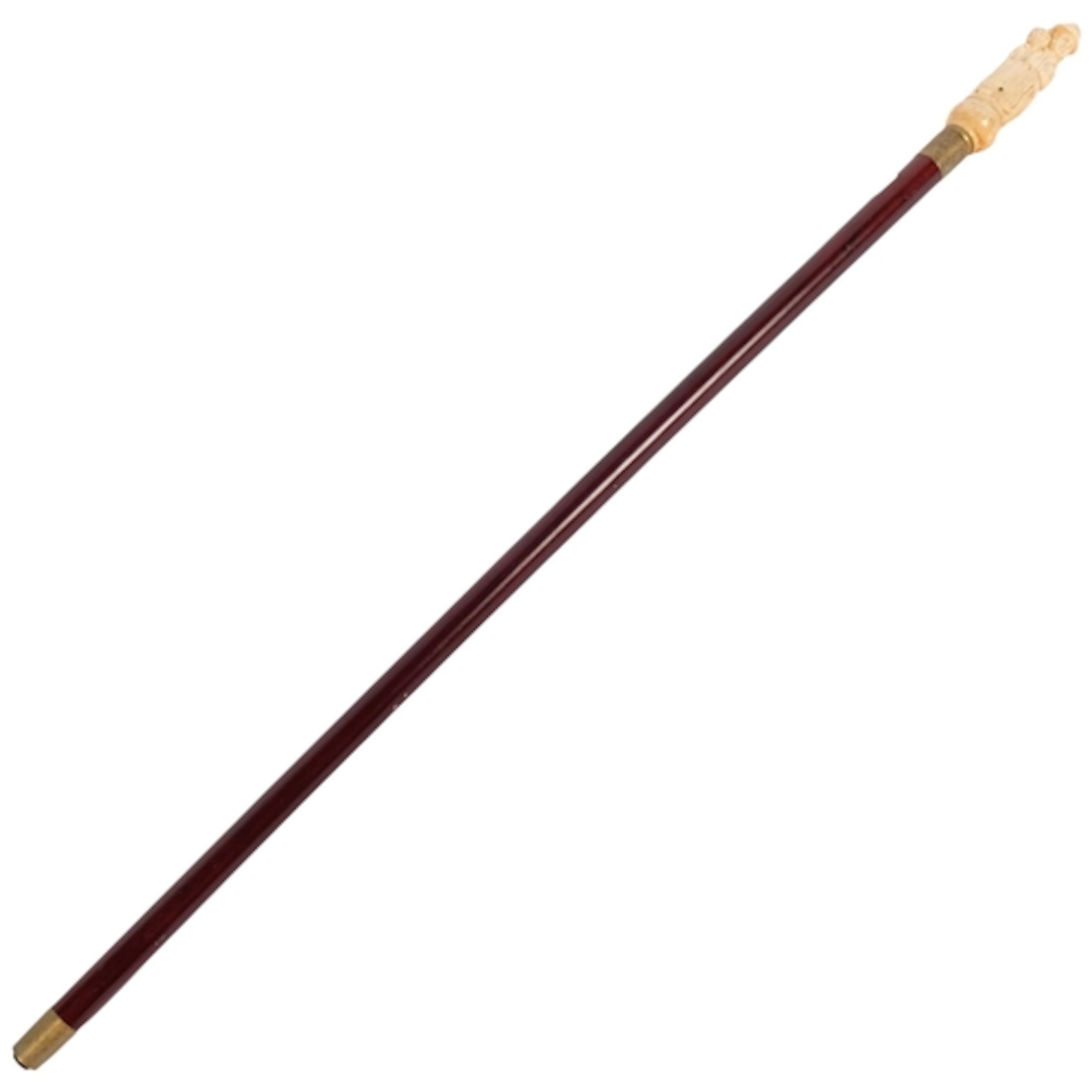 A stained wood walking cane with carved bone erotic handle, ...