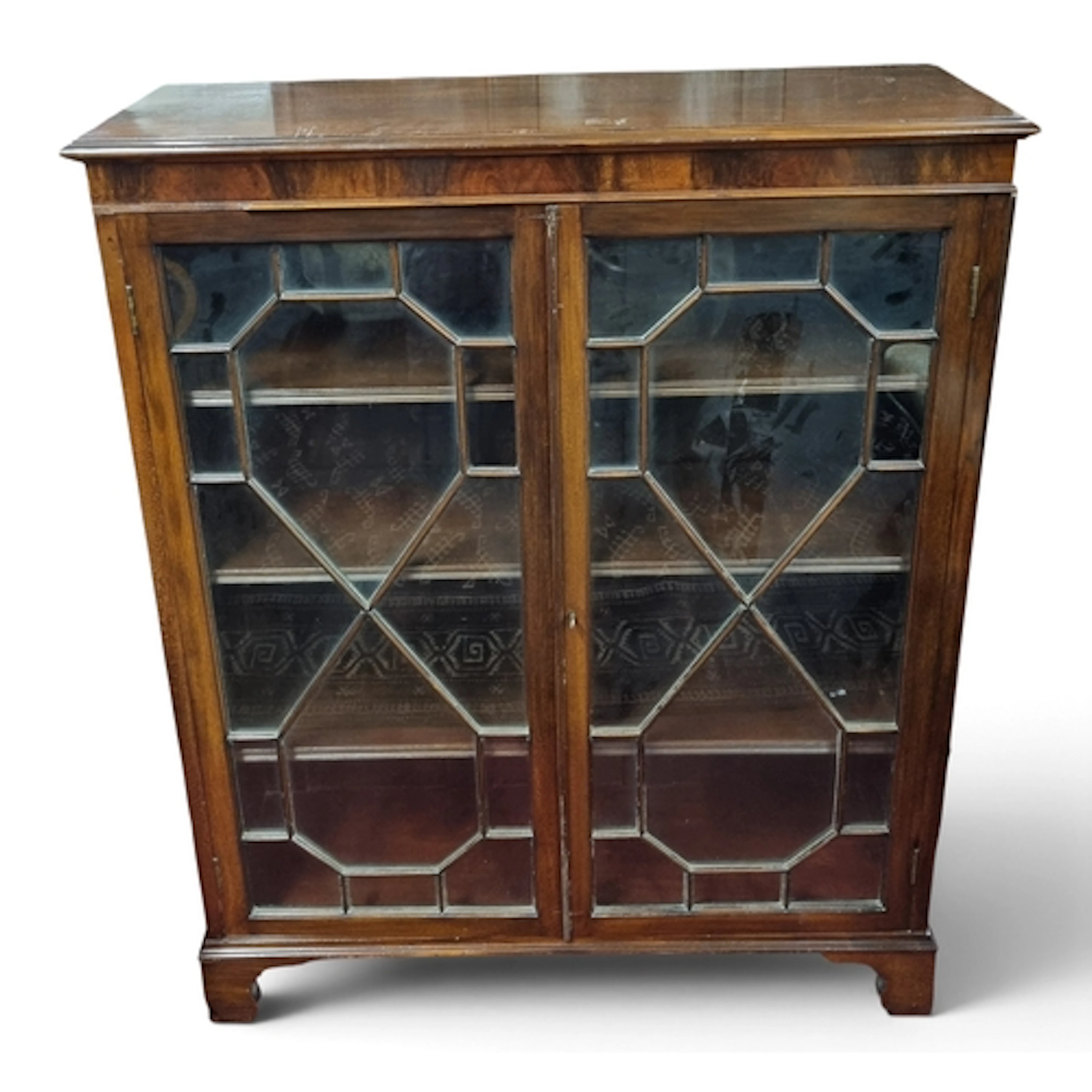 An Edwardian Mahogany two door Bookcase with astragal glazed...
