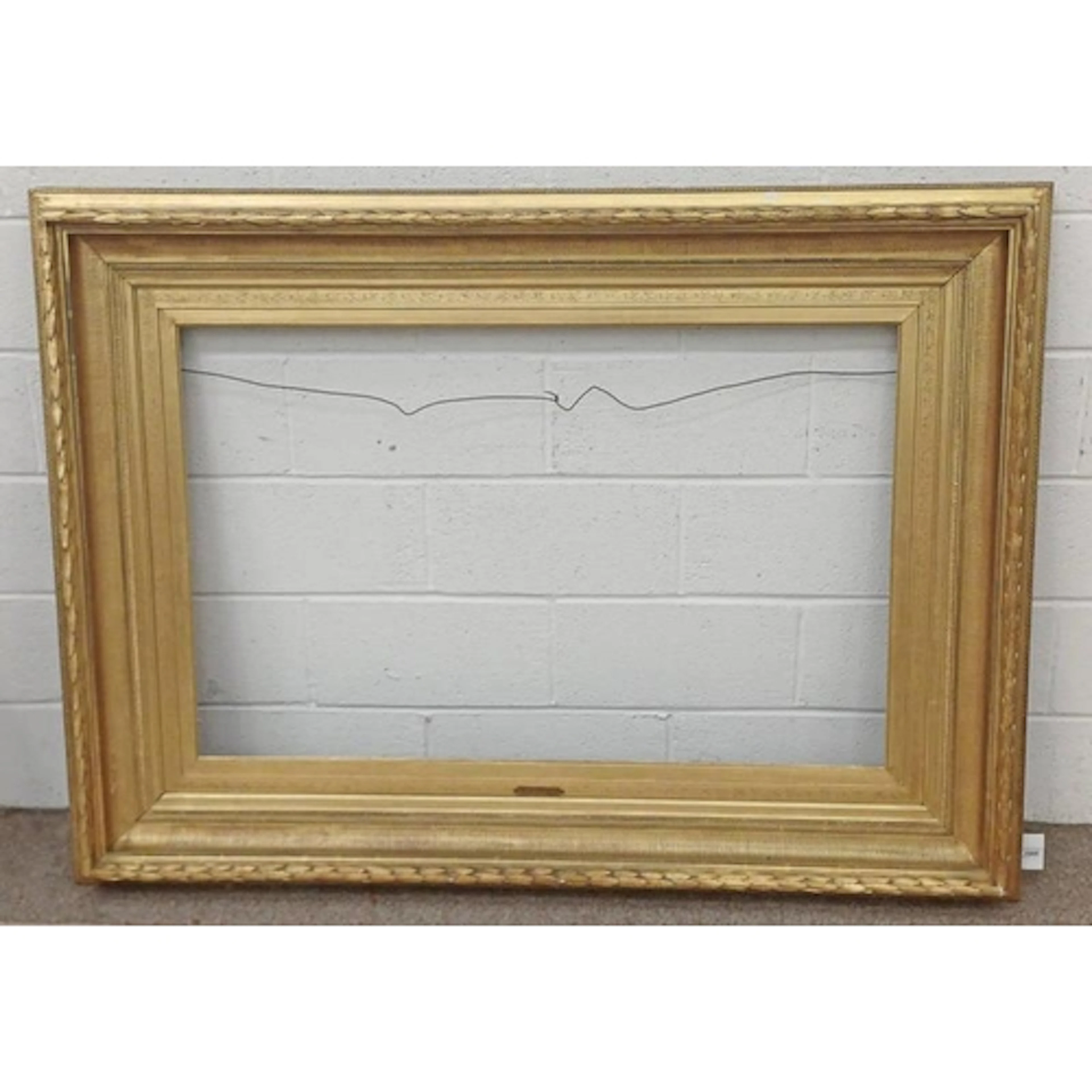 LARGE GILT PICTURE FRAME WHICH ORIGINALLY HOUSED THE PAINTIN...