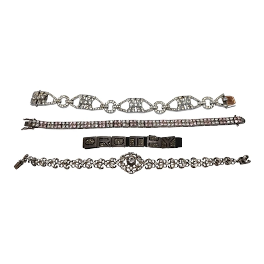 Four assorted white meal bracelets, to include silver and tw...