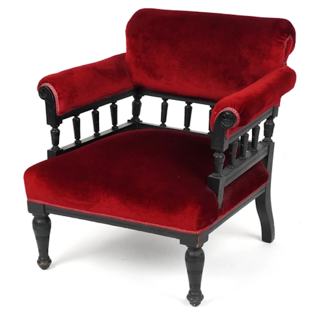 Victorian ebonised open armchair with red velvet upholstered...