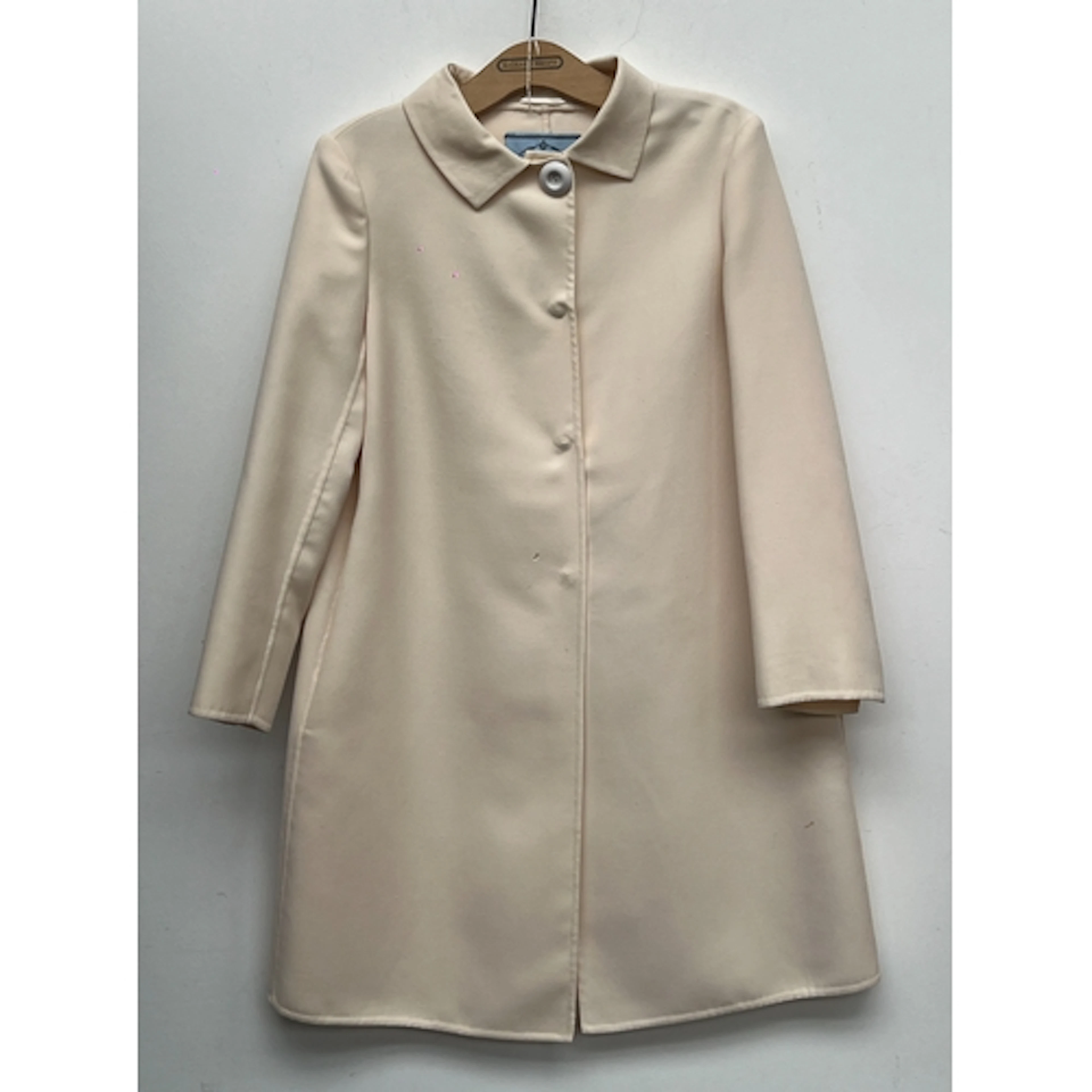 A Prada Milano ivory wool coat, size 42