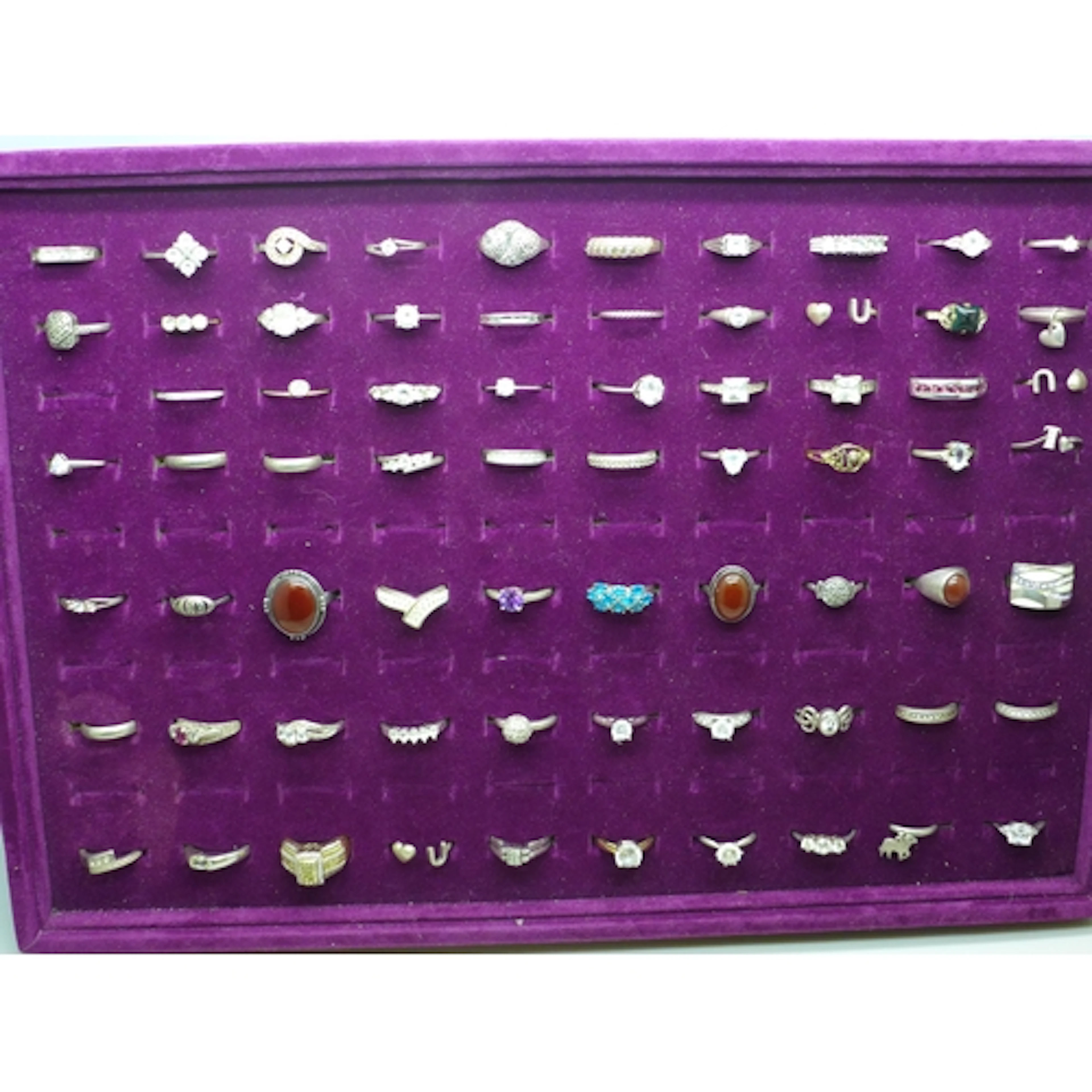 A collection of silver rings, 158g, fourteen silver and gold...