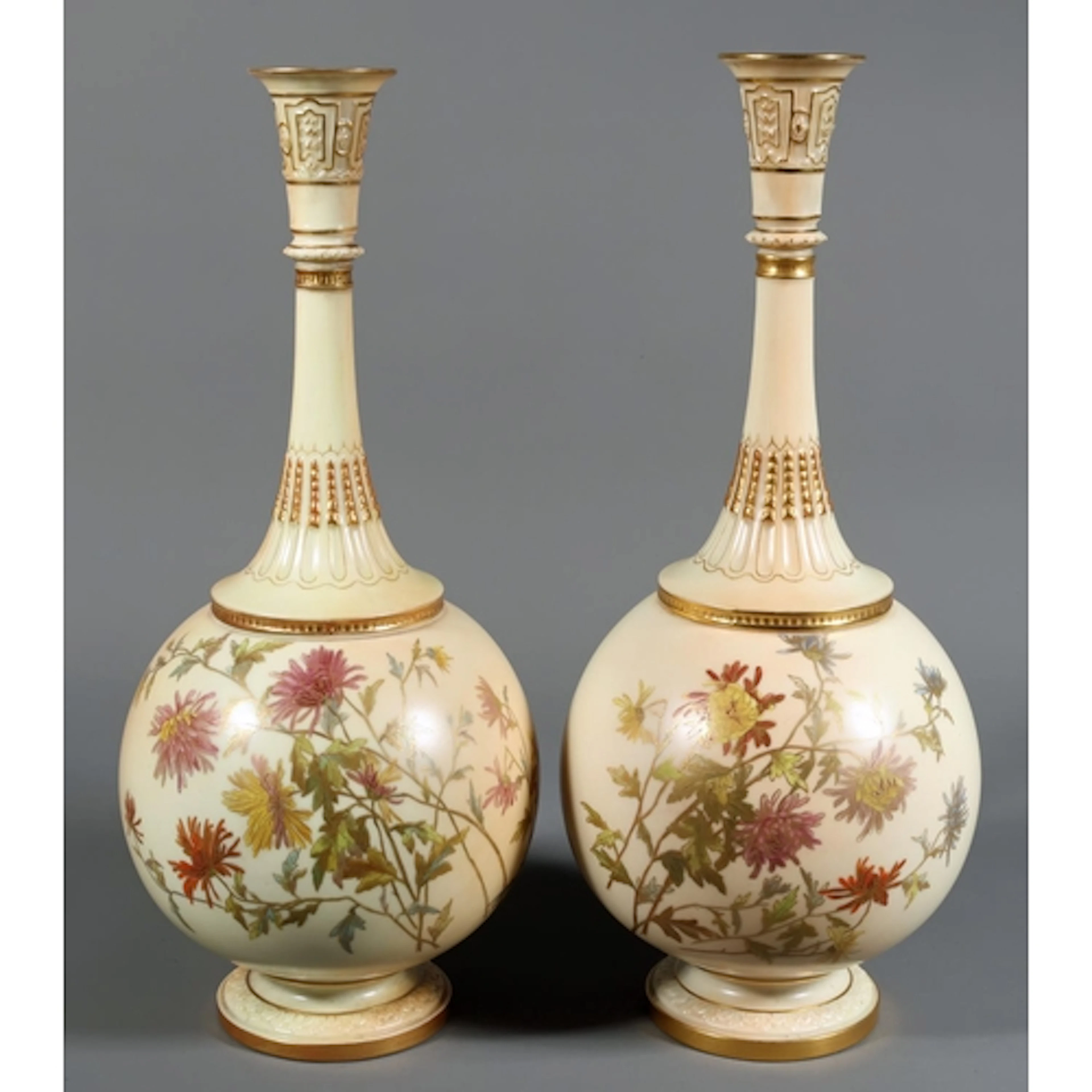 Pair of Royal Worcester porcelain blush ivory vases with tal...