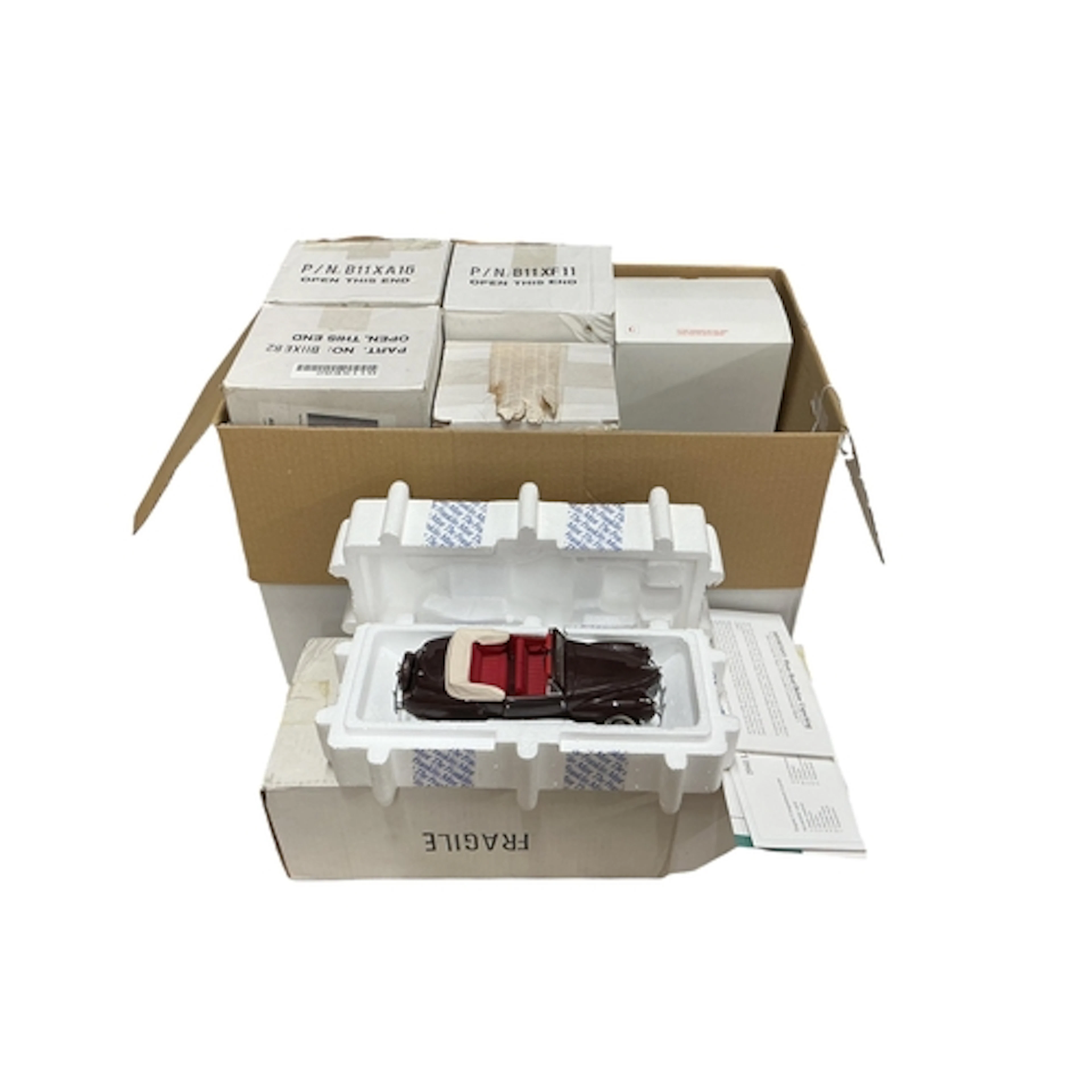 Six boxed Franklin Mint and Danbury Mint model vehicles; a 1...