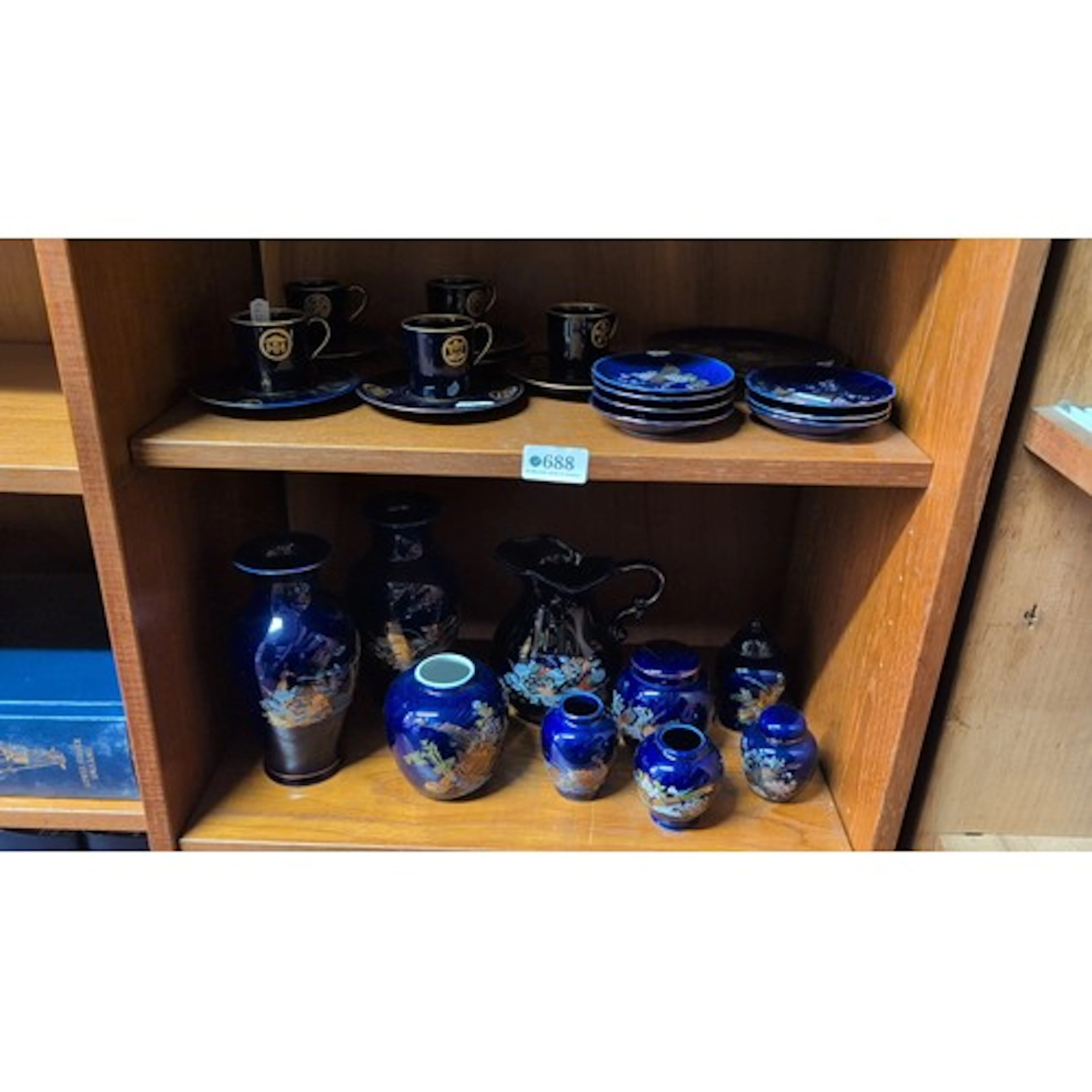 A collection of Japanese-style cobalt-ground porcelain table...