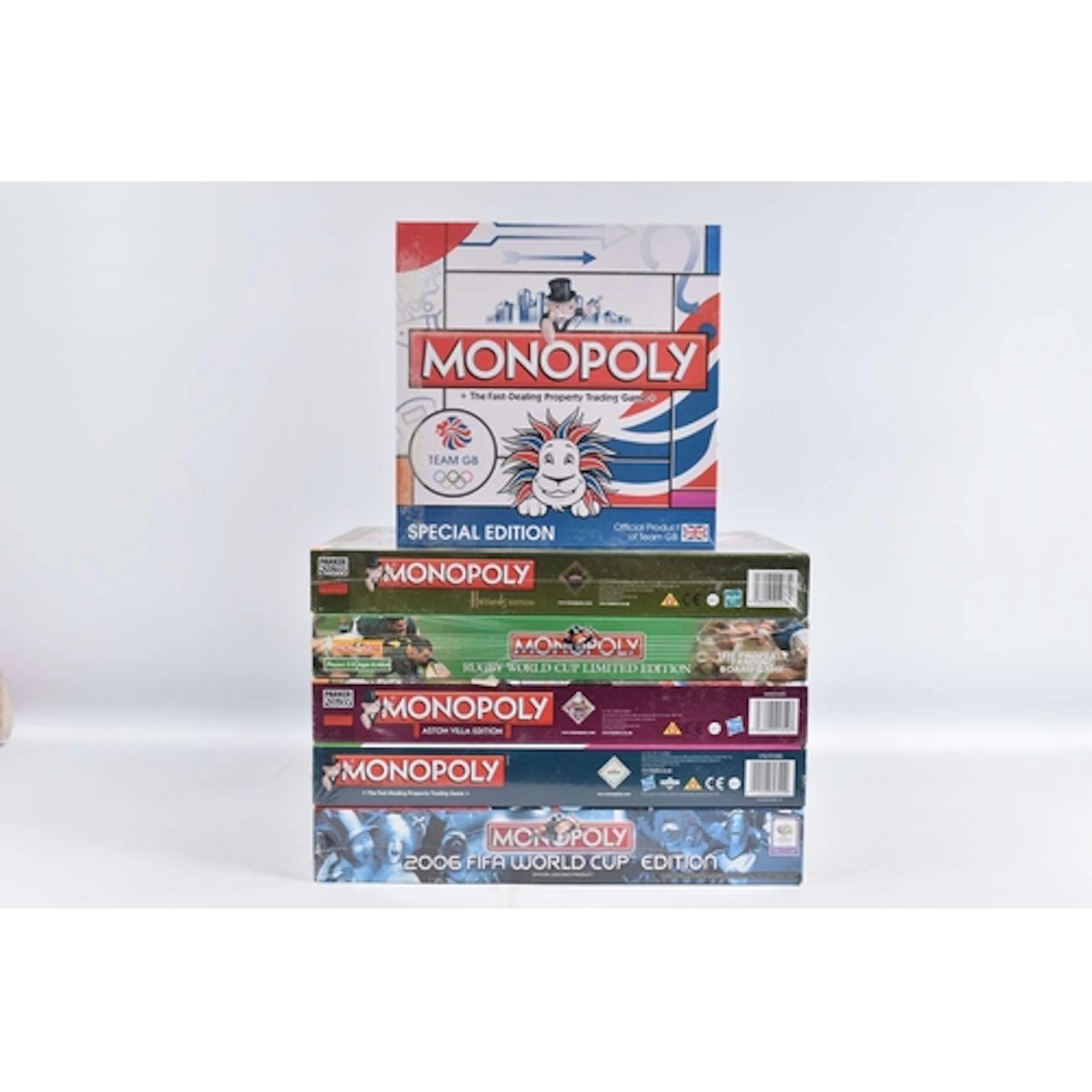 SIX MONOPOLY SPORTS RELATED BOARD GAMES, to include a Hasbro...