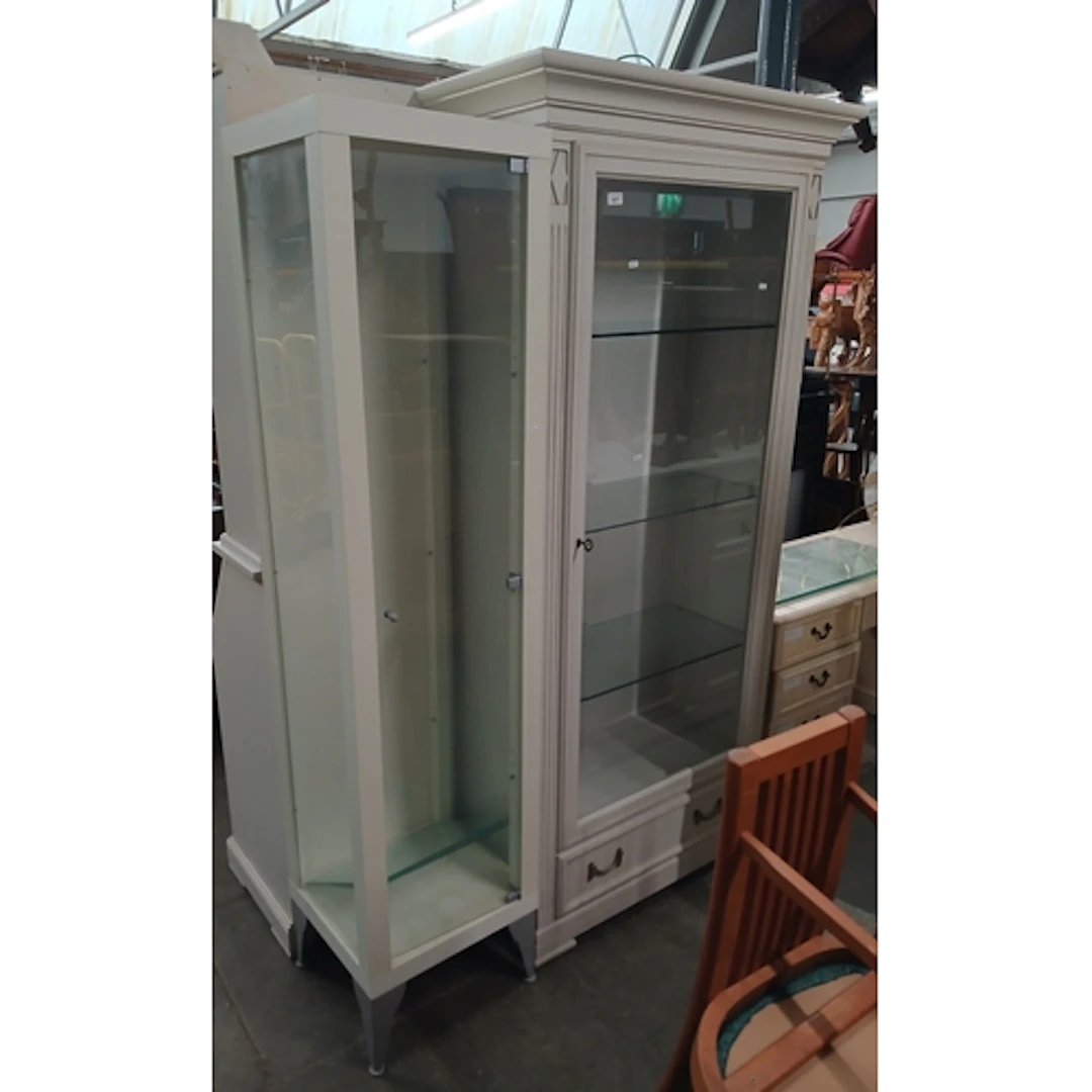 A Selva glazed cabinet and another.