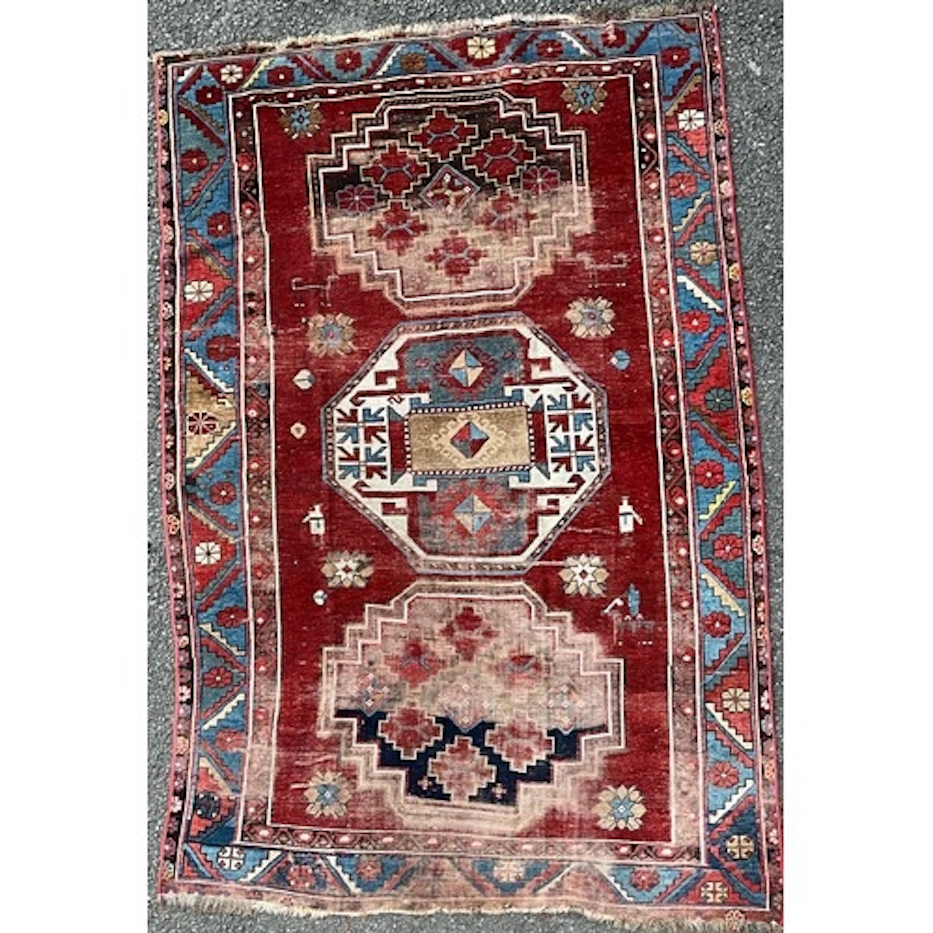 A 19th century Caucasian Kazak rug, with three principle med...