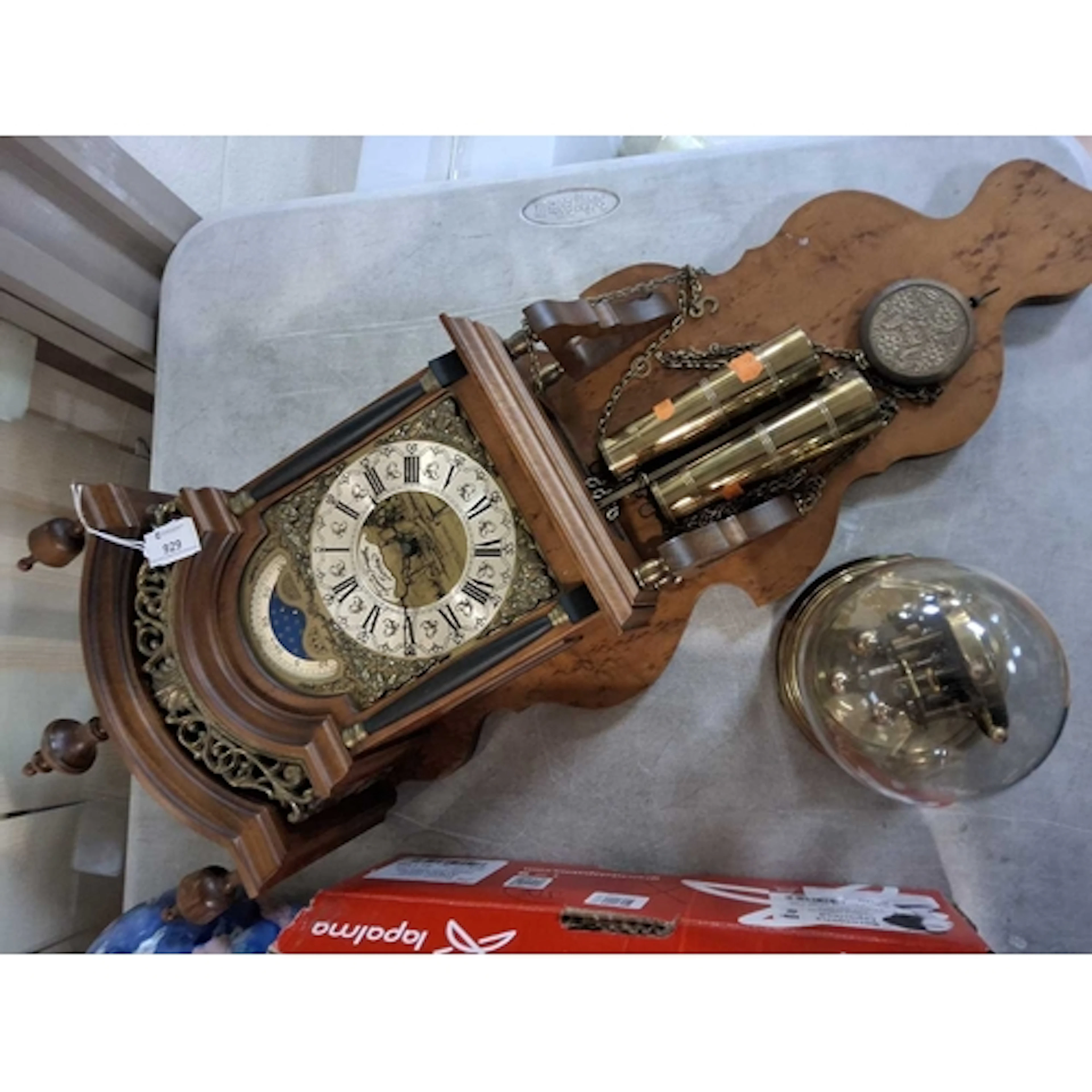 A WALL CLOCK AND ANNIVERSARY CLOCK, comprising a mid to late...