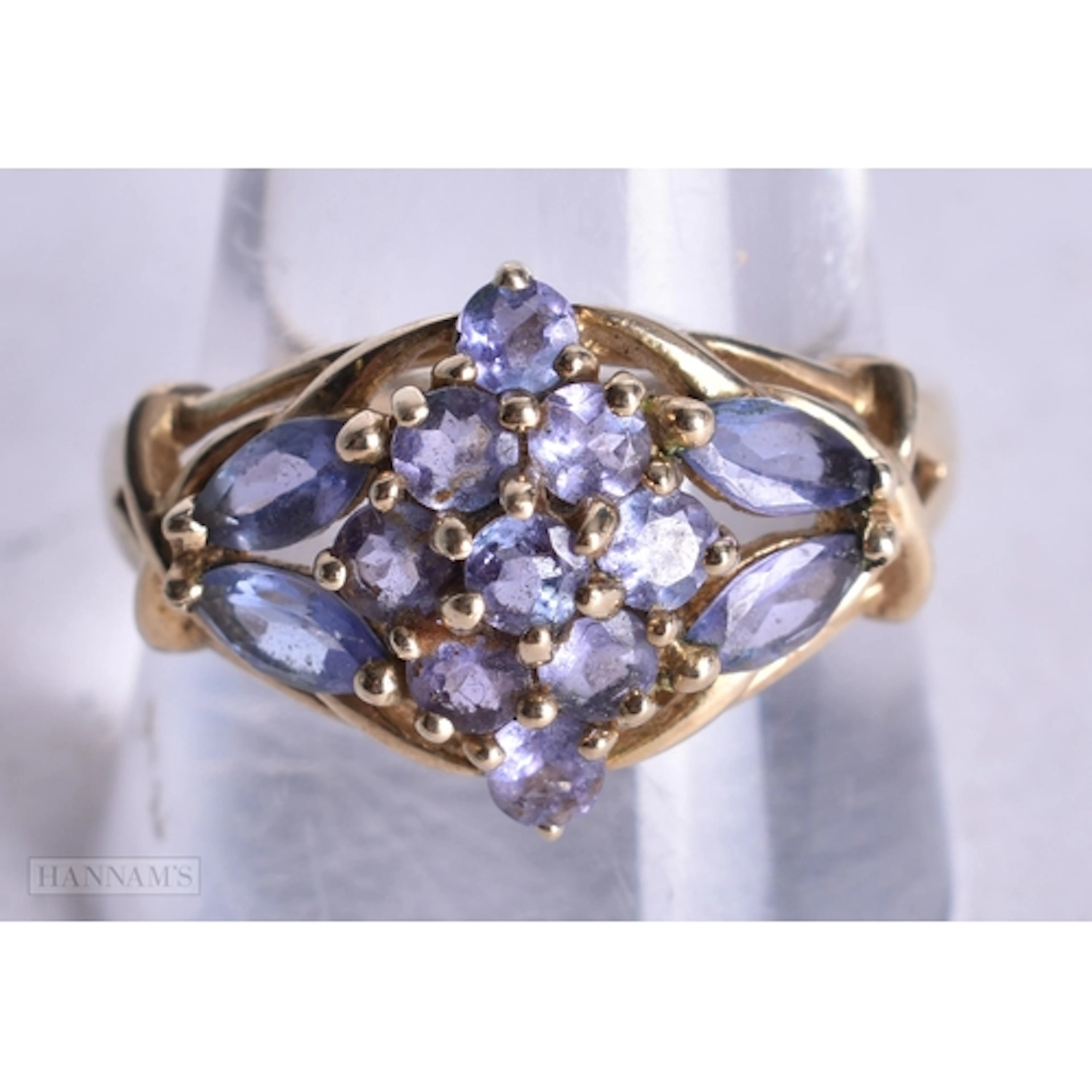 9ct gold tanzanite cluster ring (4.2g). V.