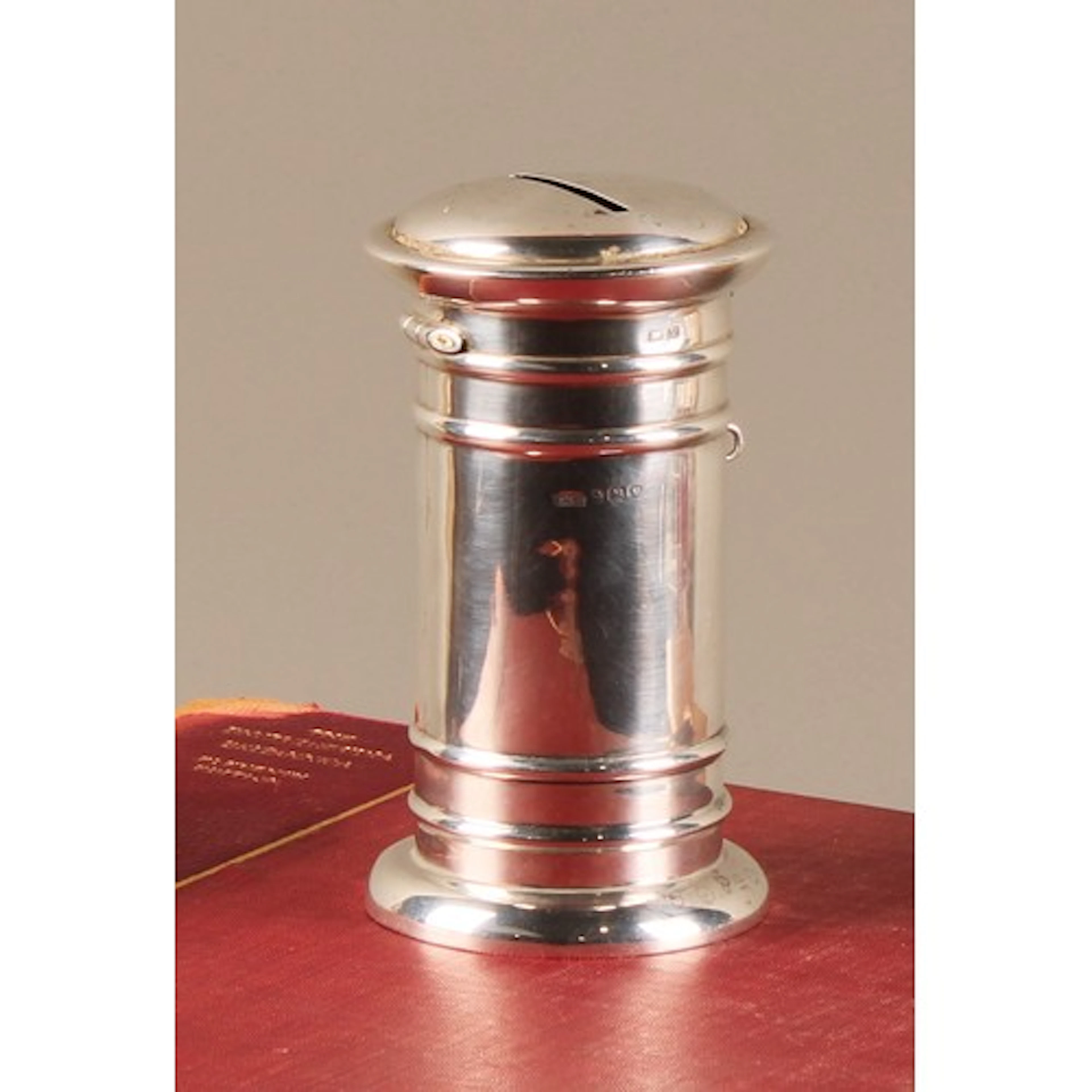 A George V silver novelty money box or bank, as a post box, ...
