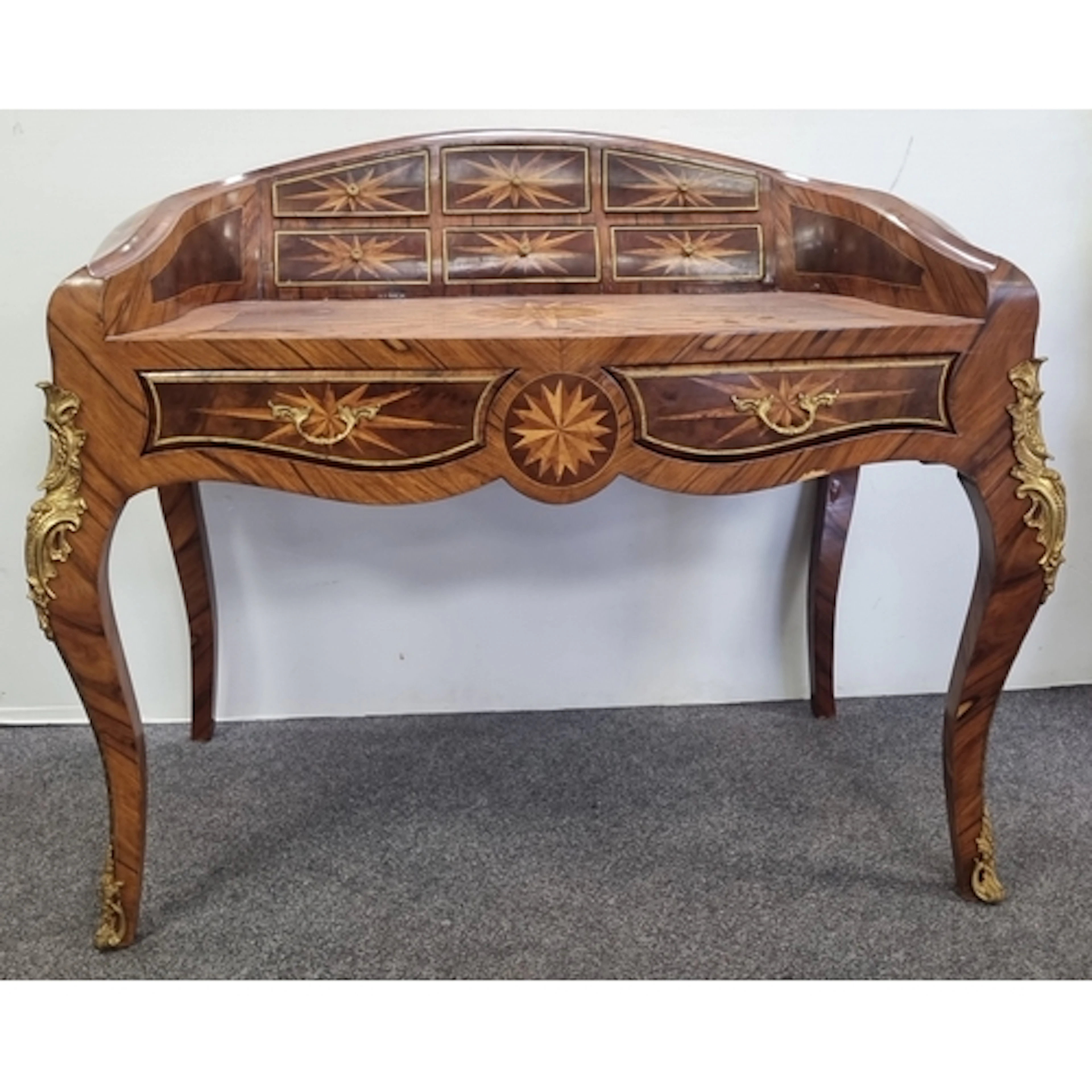 Louis XV-style marquetry writing desk with curved raised bac...