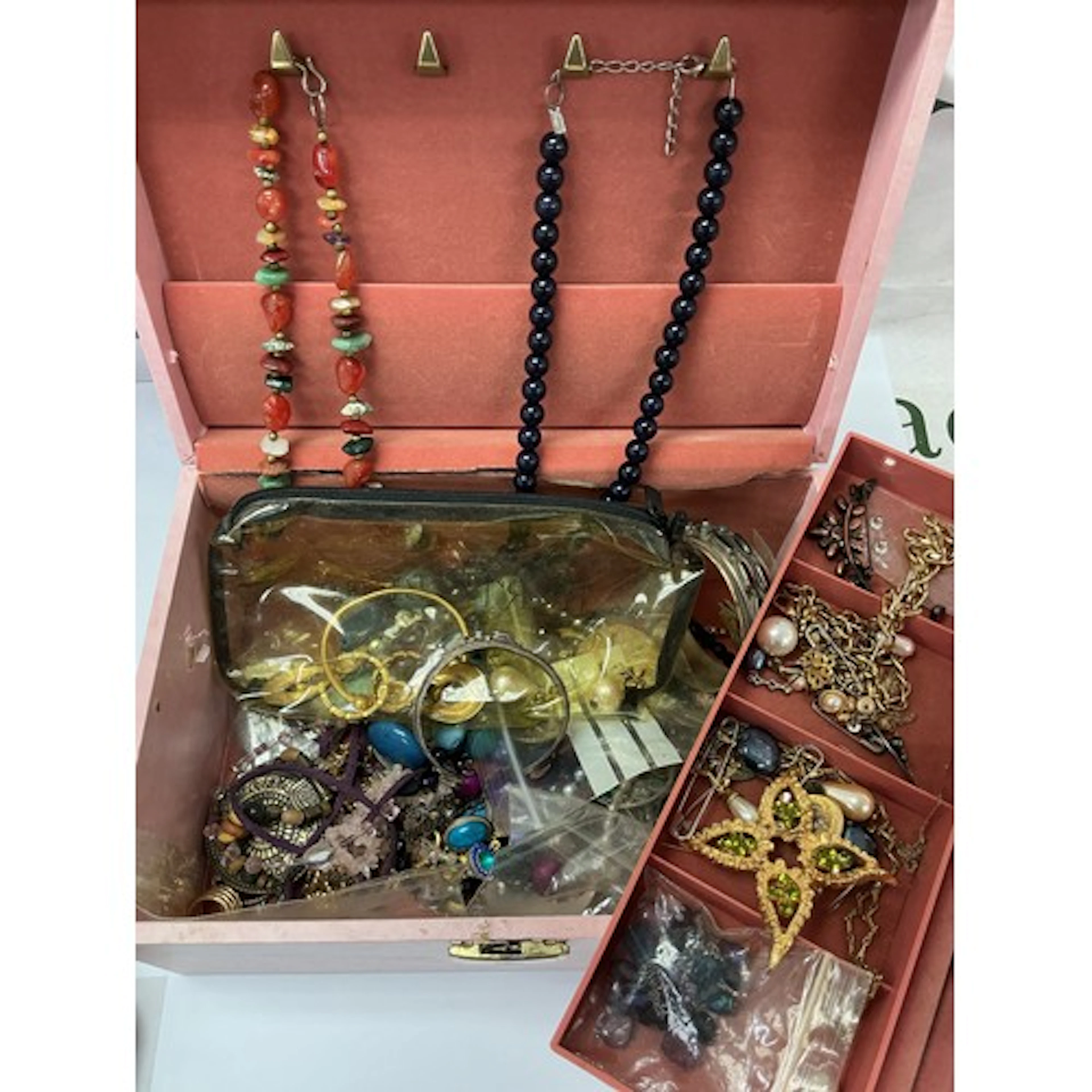 A box of assorted costume jewellery