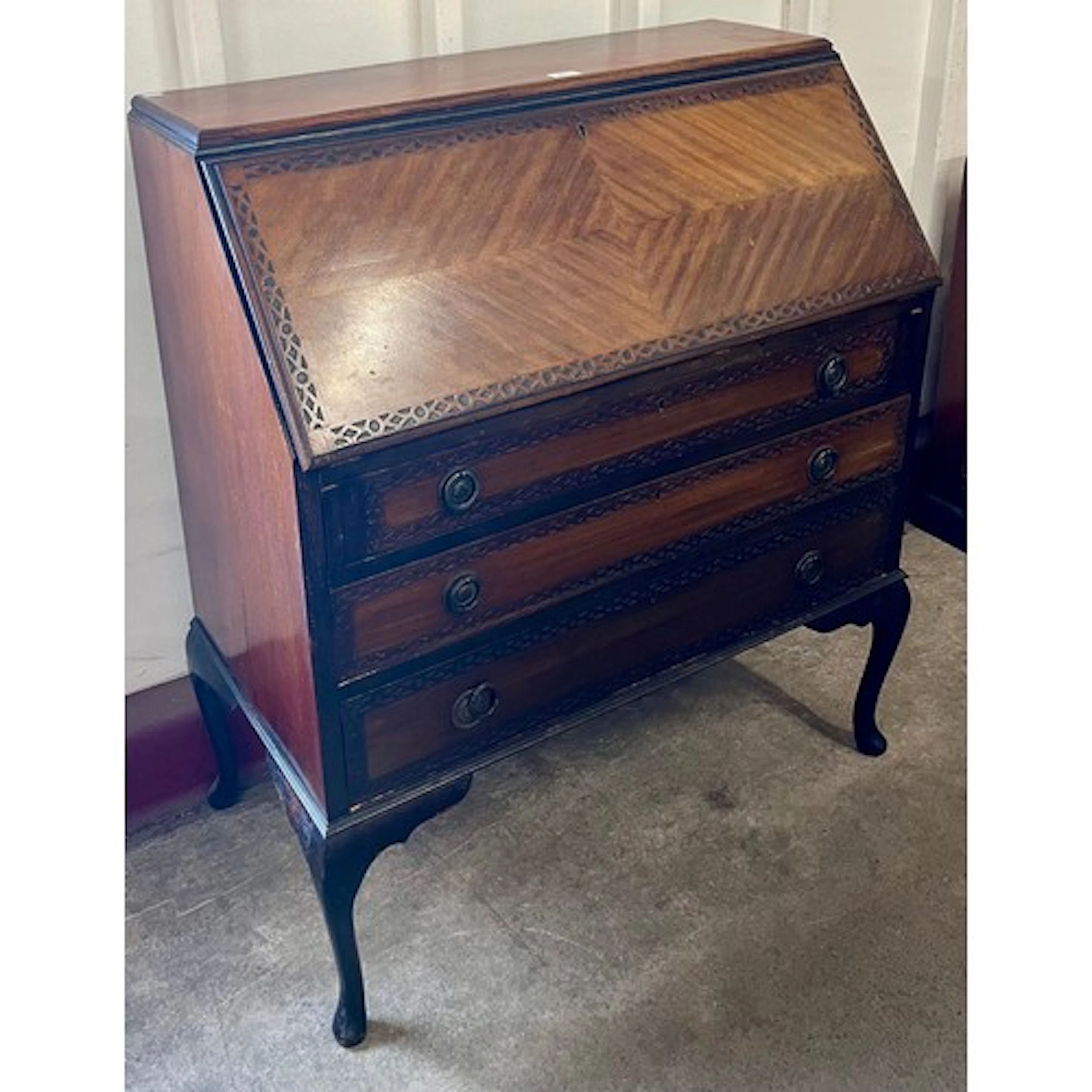 A Queen Anne style mahogany bureau